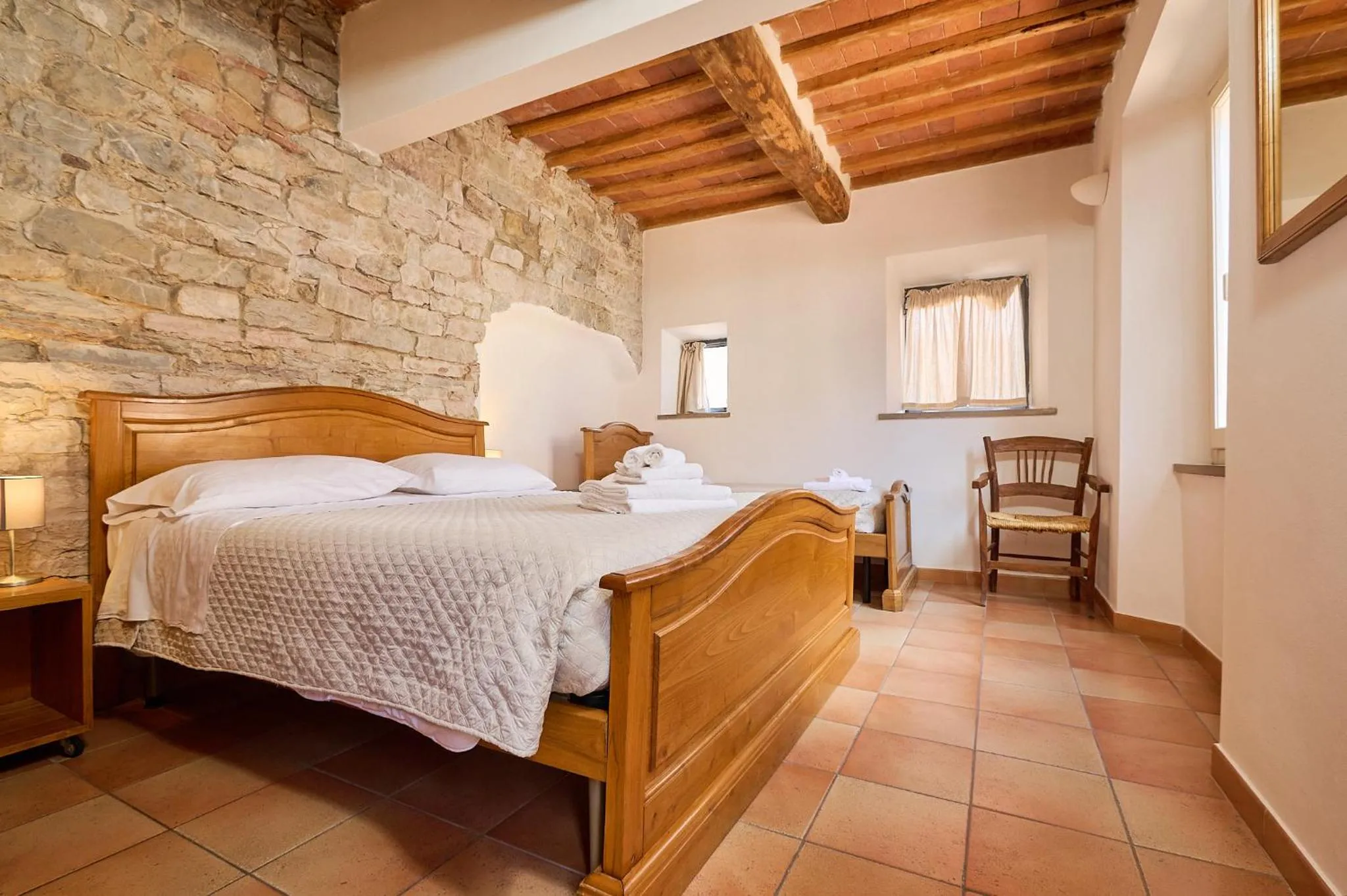 Bed in Il Chiostro Appartamenti & Suites