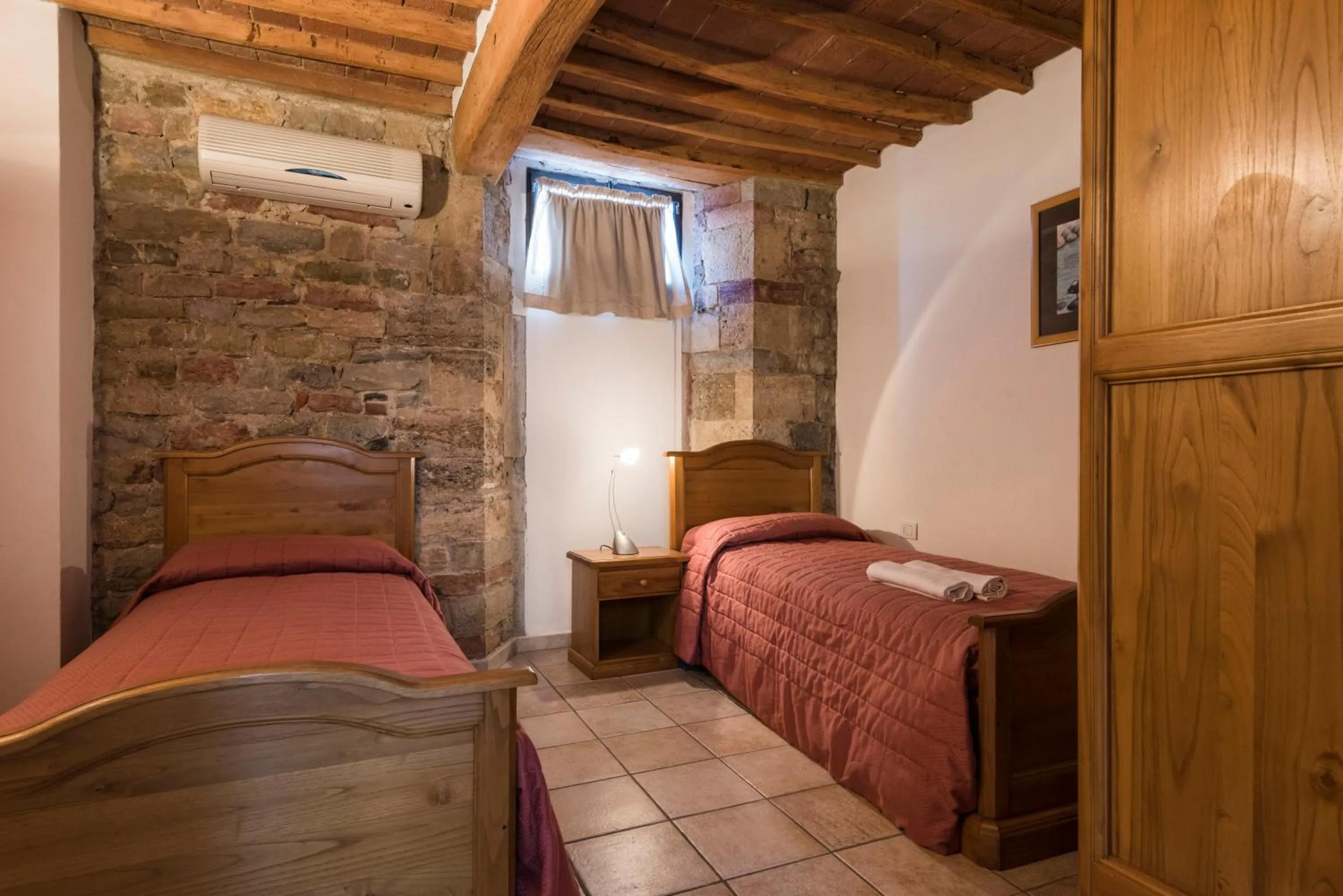 Bed in Il Chiostro Appartamenti & Suites