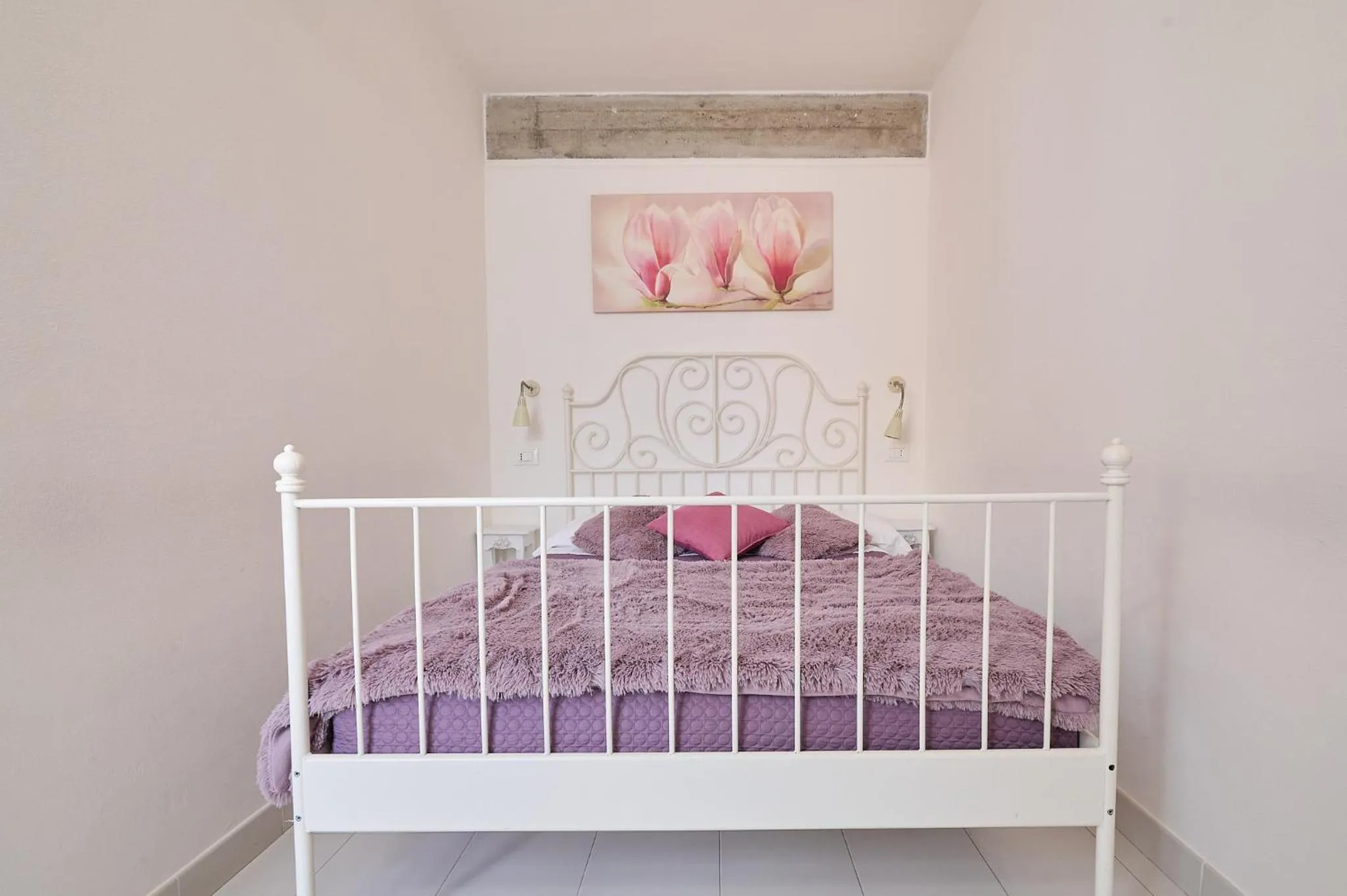 Bed in Il Chiostro Appartamenti & Suites