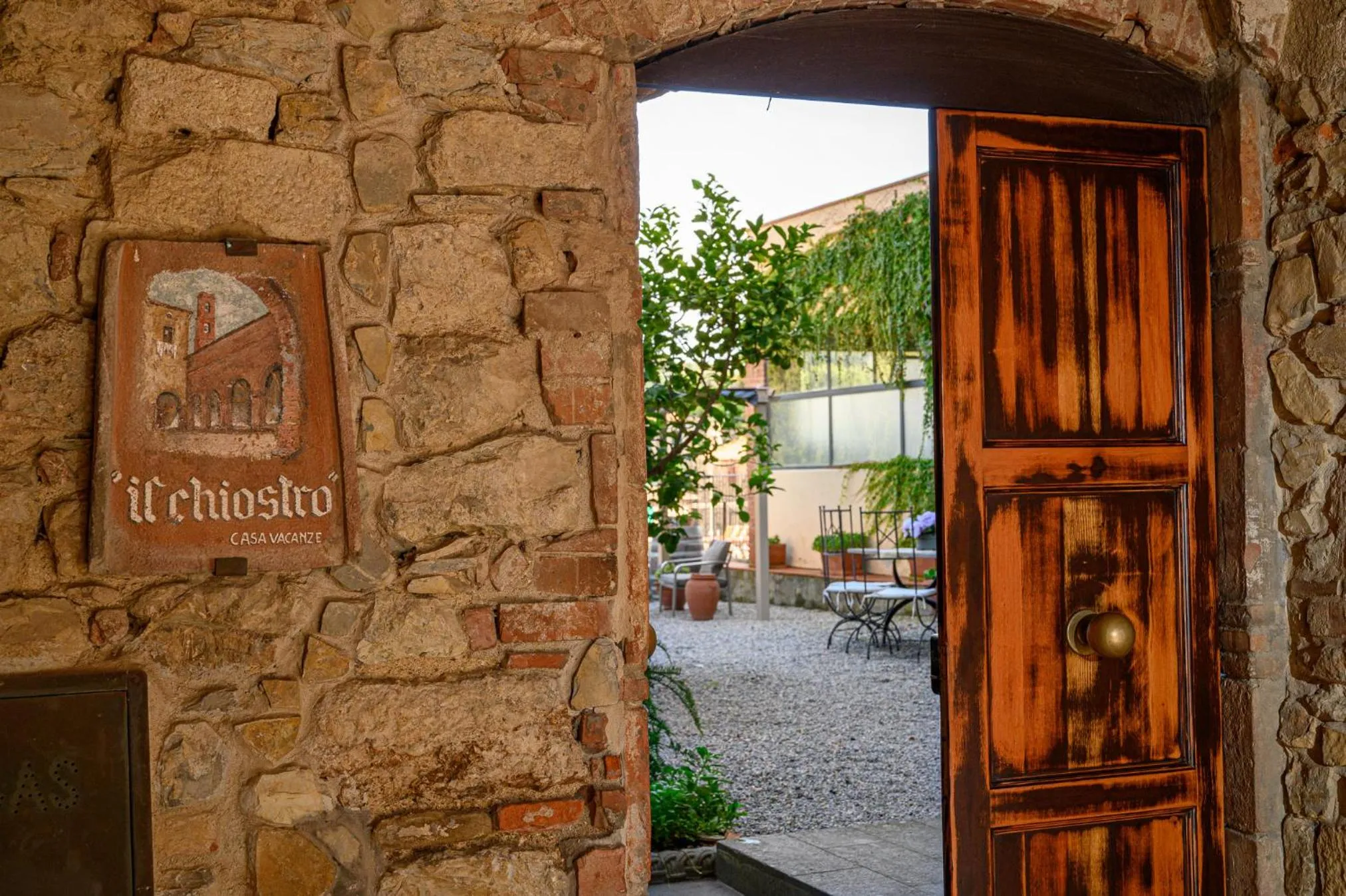 Property logo or sign in Il Chiostro Appartamenti & Suites