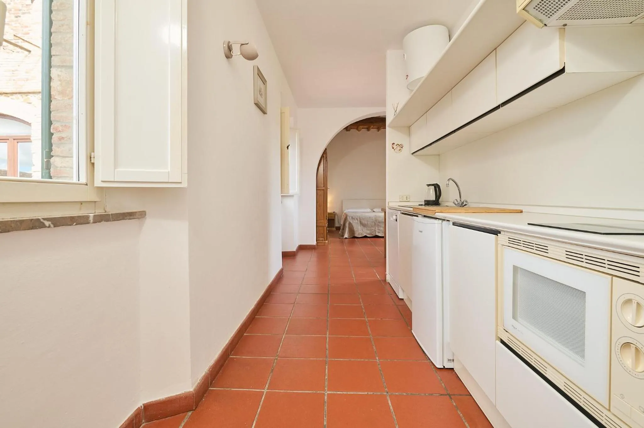 Kitchen or kitchenette in Il Chiostro Appartamenti & Suites