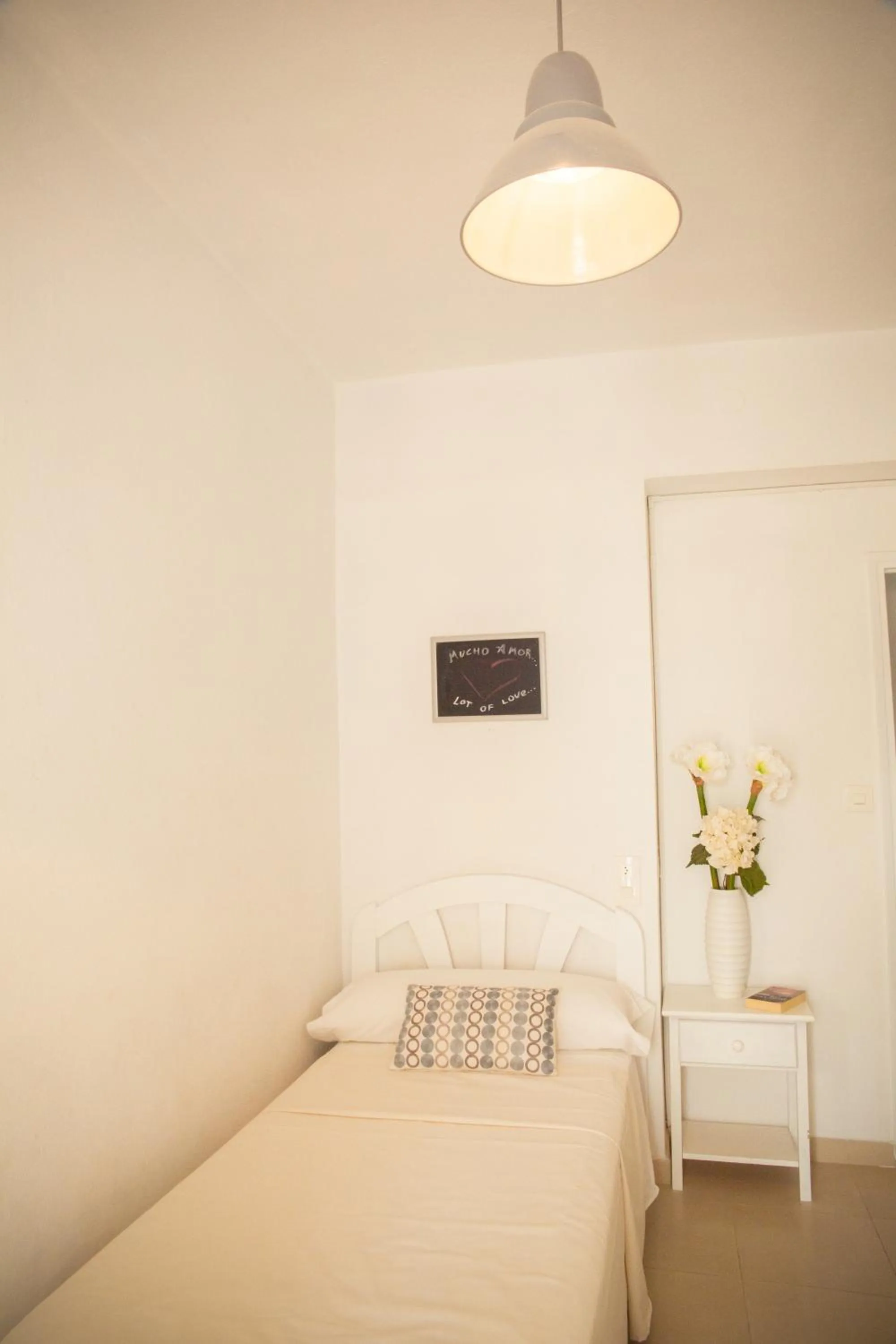 Photo of the whole room, Bed in Hostal Sunset Ibiza