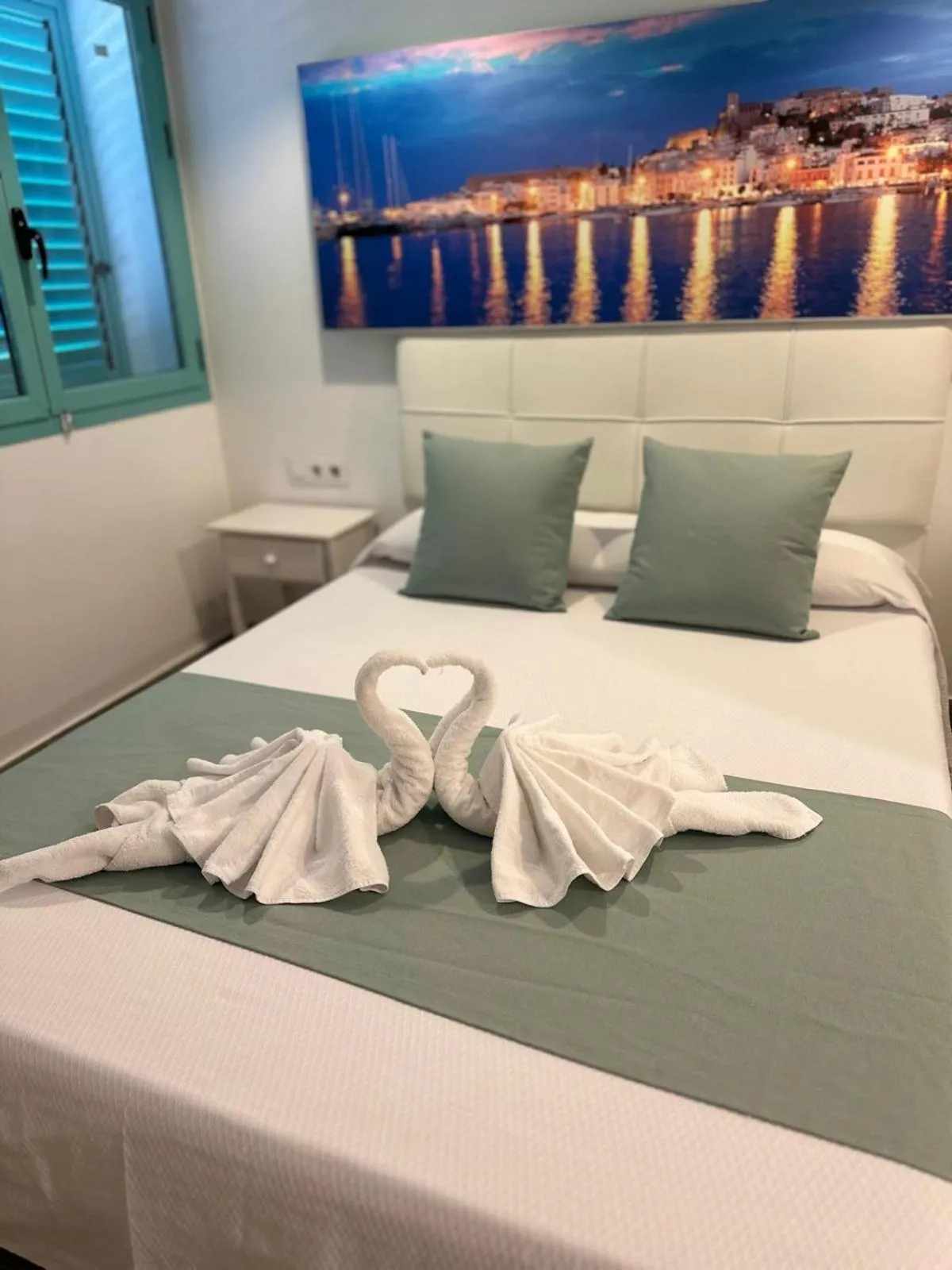 towels, Bed in Hostal Sunset Ibiza