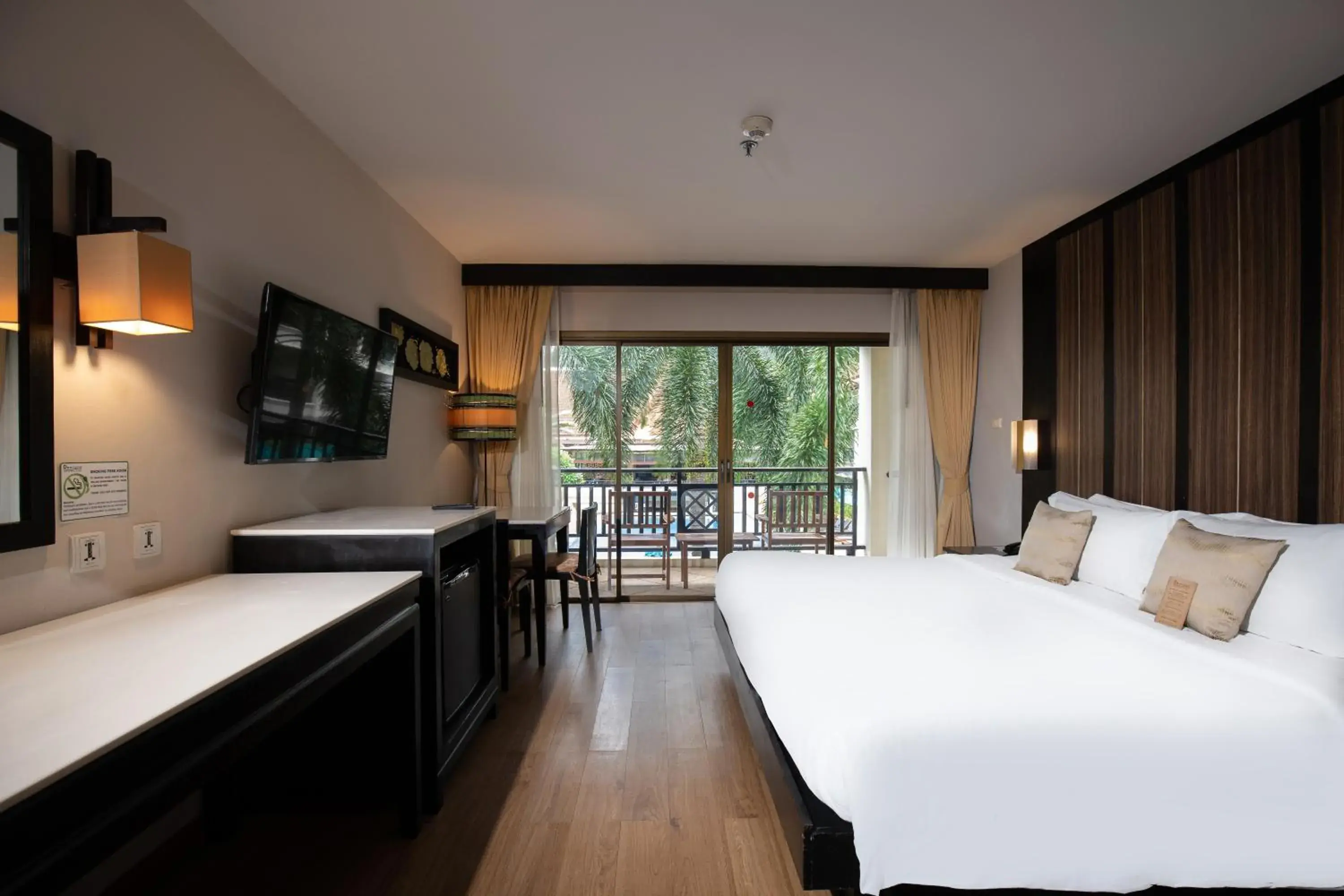 Photo of the whole room, Bed in Deevana Patong Resort & Spa Photo of the whole room, Bed in Deevana Patong Resort & Spa
