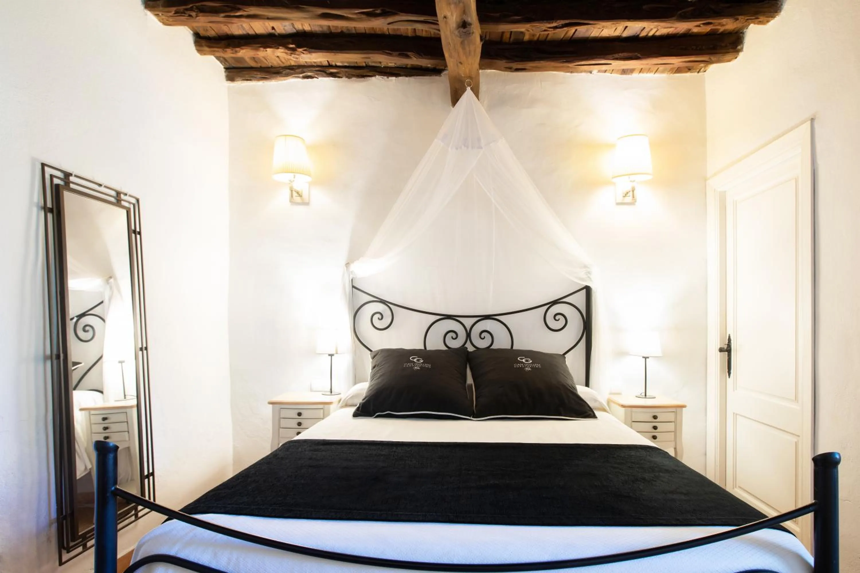 Bed in Agroturismo Can Guillem