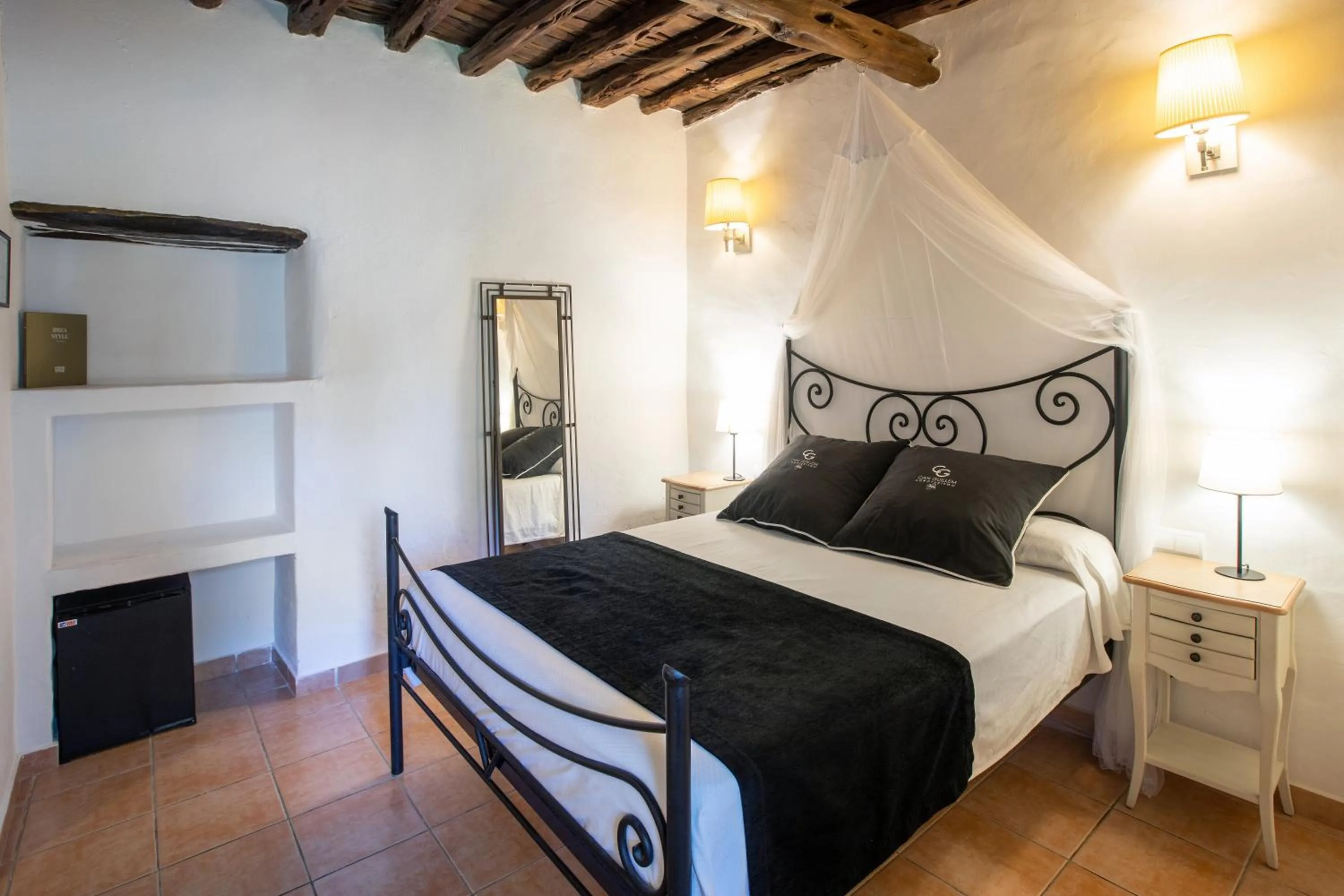 Bed in Agroturismo Can Guillem