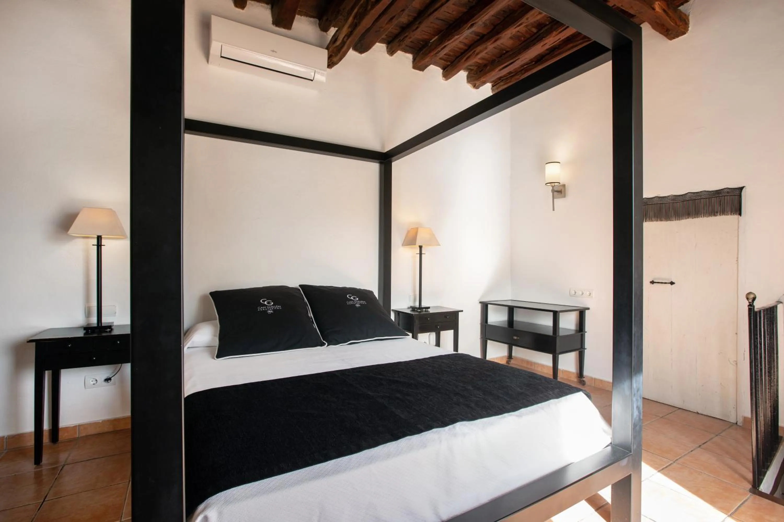 Bed in Agroturismo Can Guillem