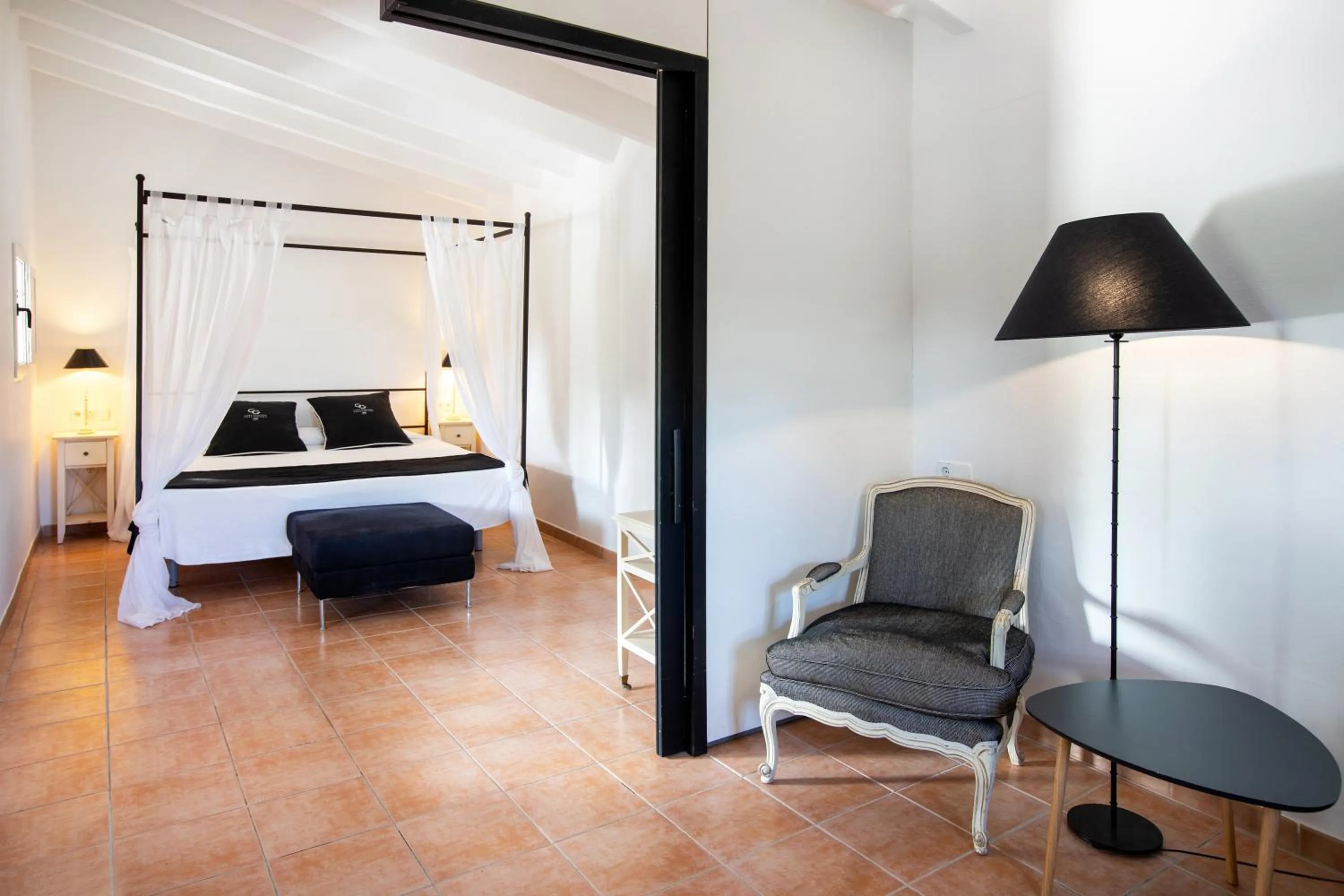 Bed in Agroturismo Can Guillem