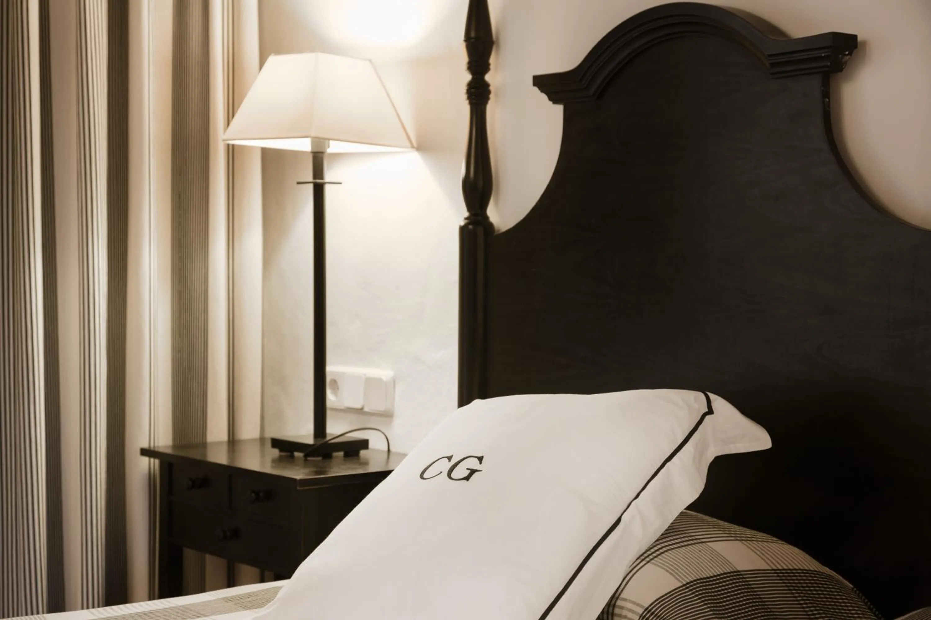 Bed in Agroturismo Can Guillem