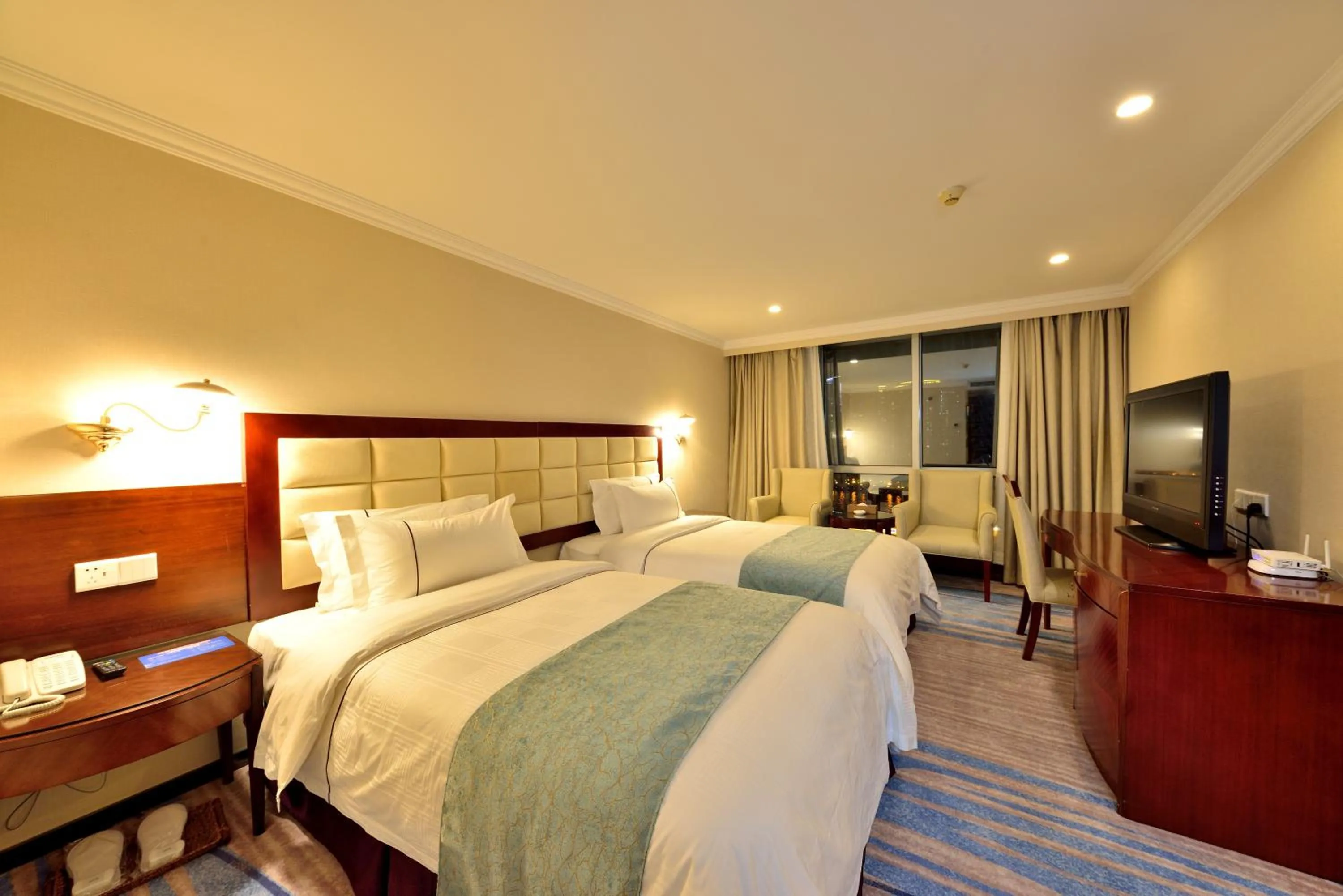 Bed in Hai Jun Hotel Guangzhou