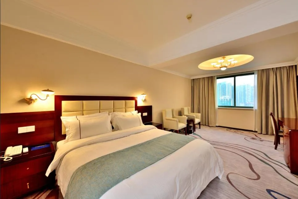 Bed in Hai Jun Hotel Guangzhou