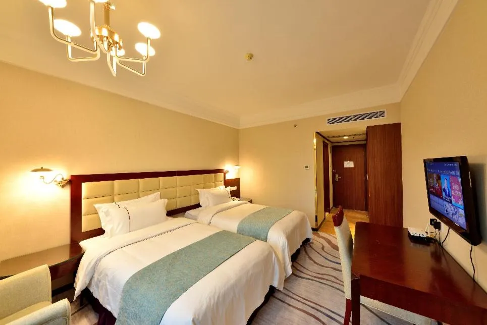 Bed in Hai Jun Hotel Guangzhou