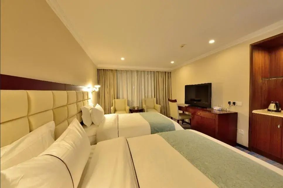 Bed in Hai Jun Hotel Guangzhou Bed in Hai Jun Hotel Guangzhou