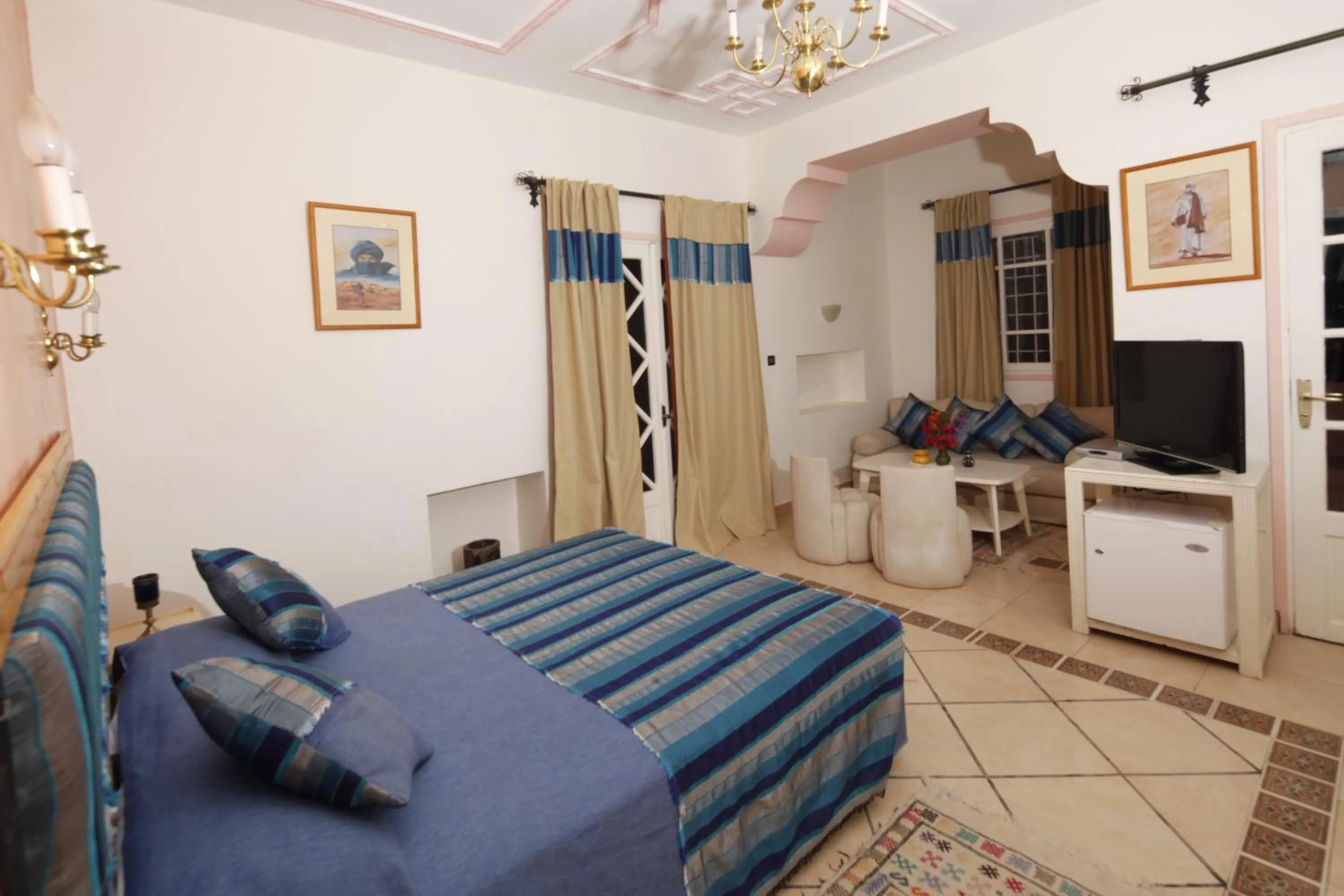 Bedroom in Hôtel Le Tinsouline