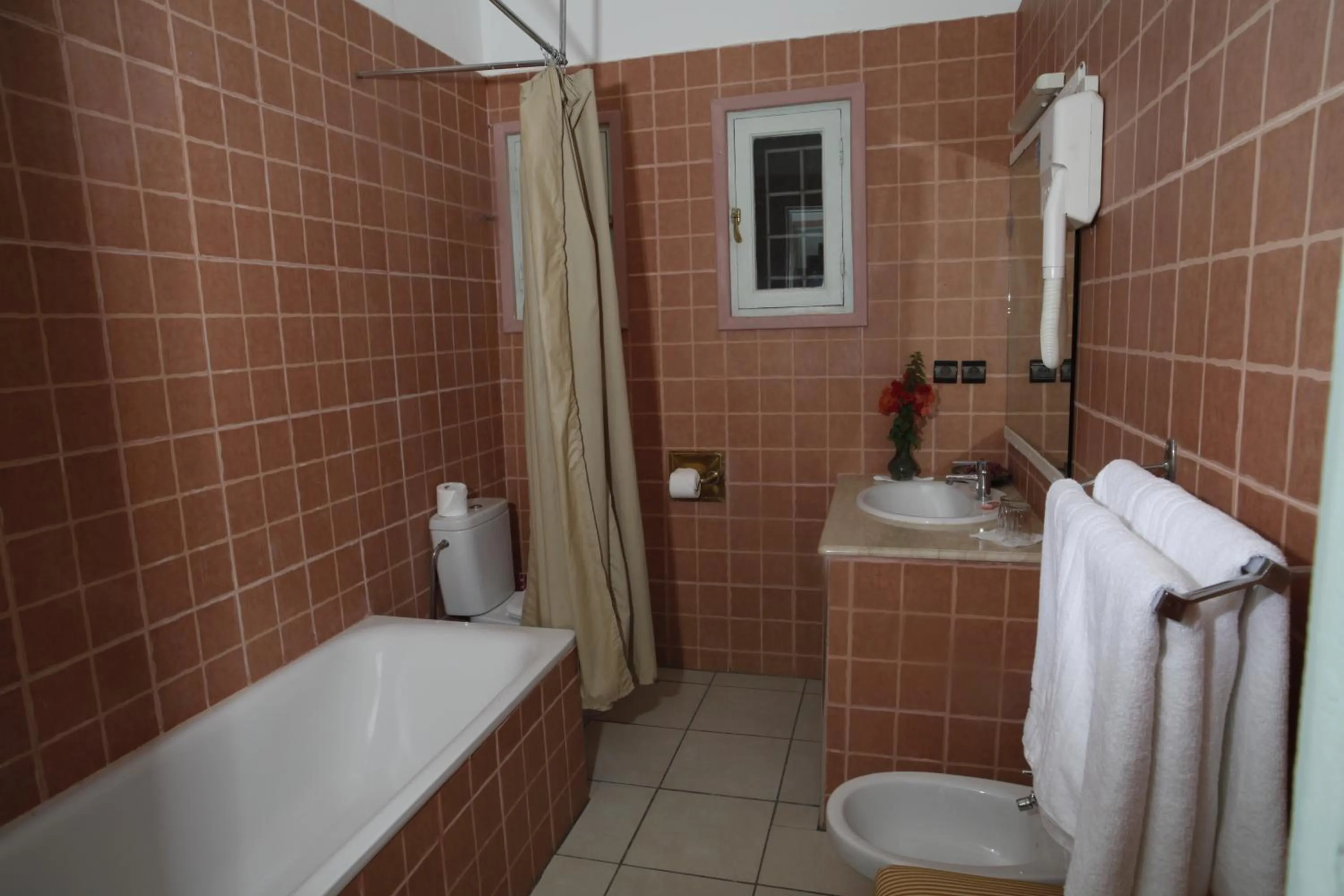 Bathroom in Hôtel Le Tinsouline