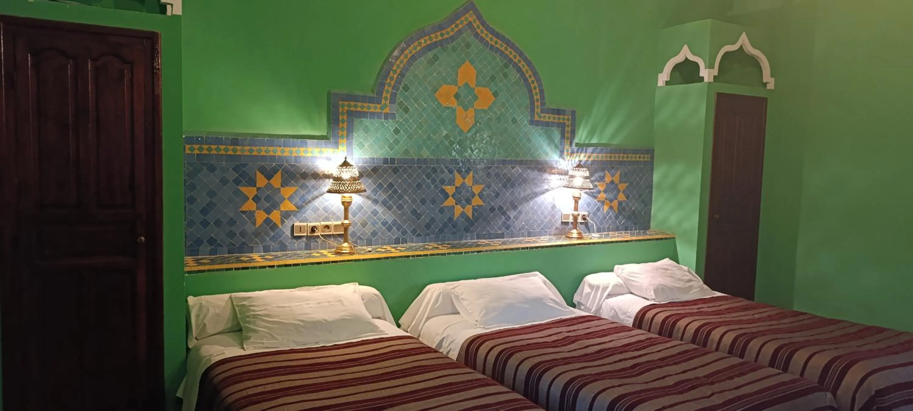 Bed in Hotel Kasbah Azalay