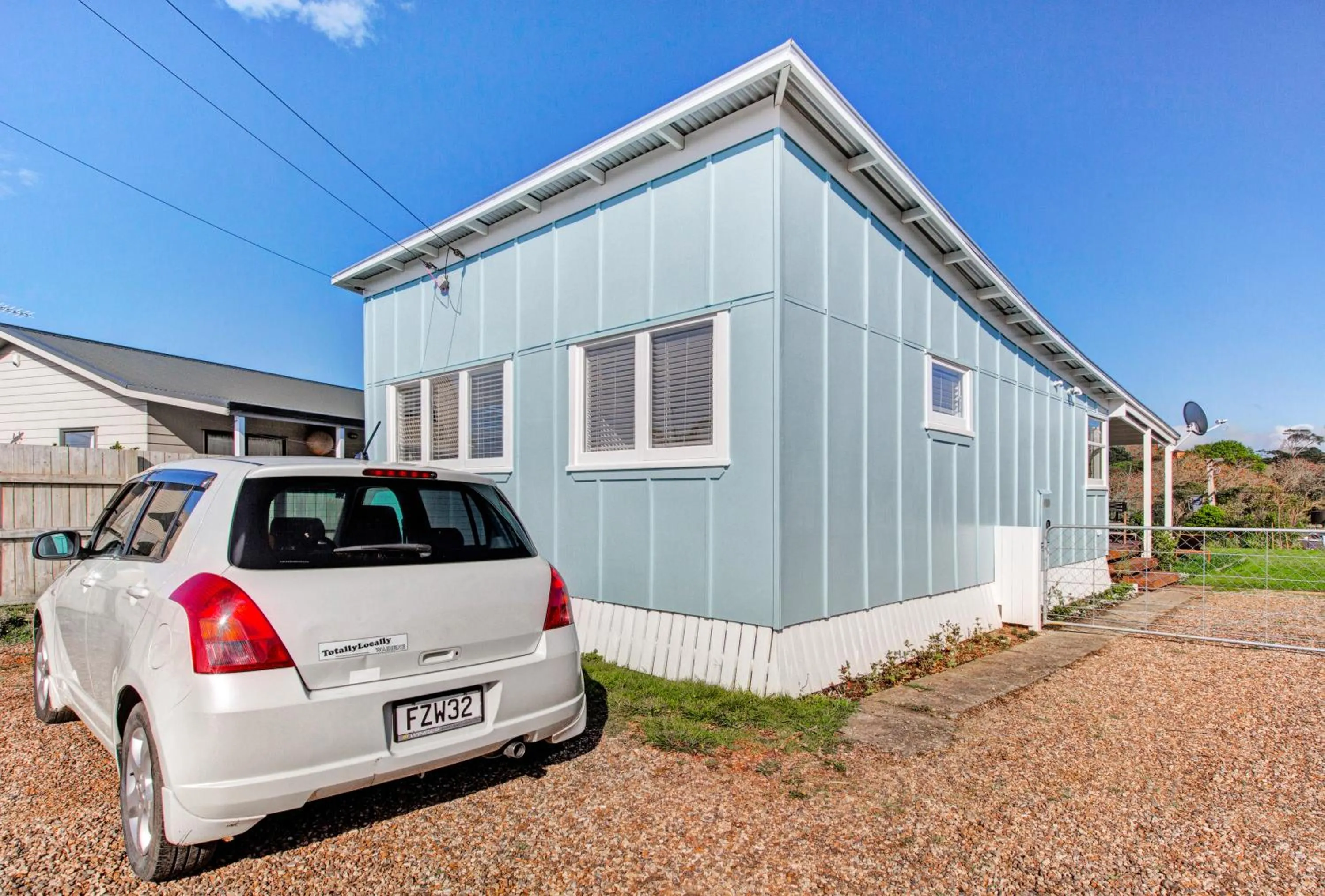 The Little Blue Bach in Oneroa Village by Waiheke Unlimited