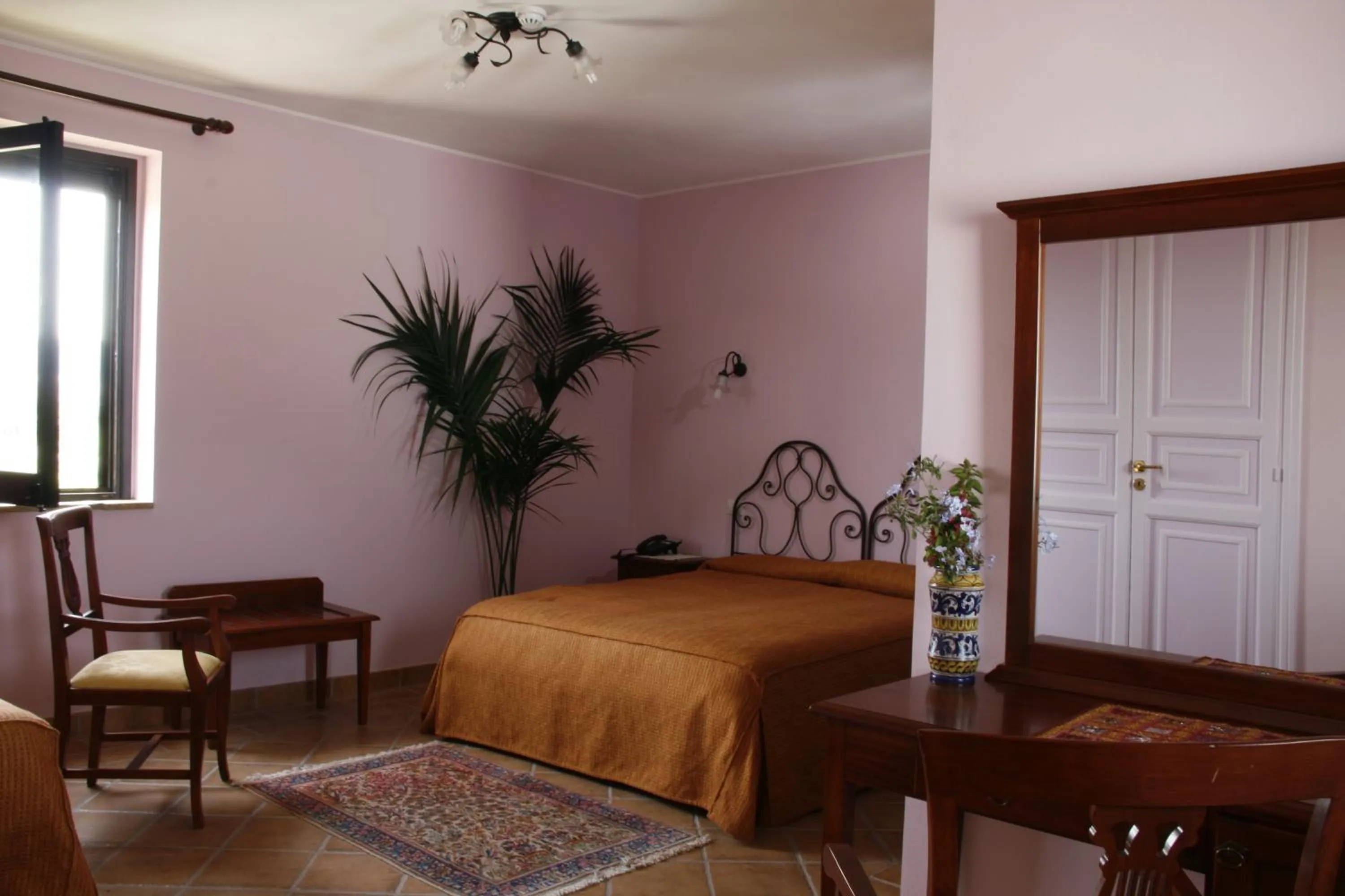 Decorative detail, Bed in Don Giovanni Hotel