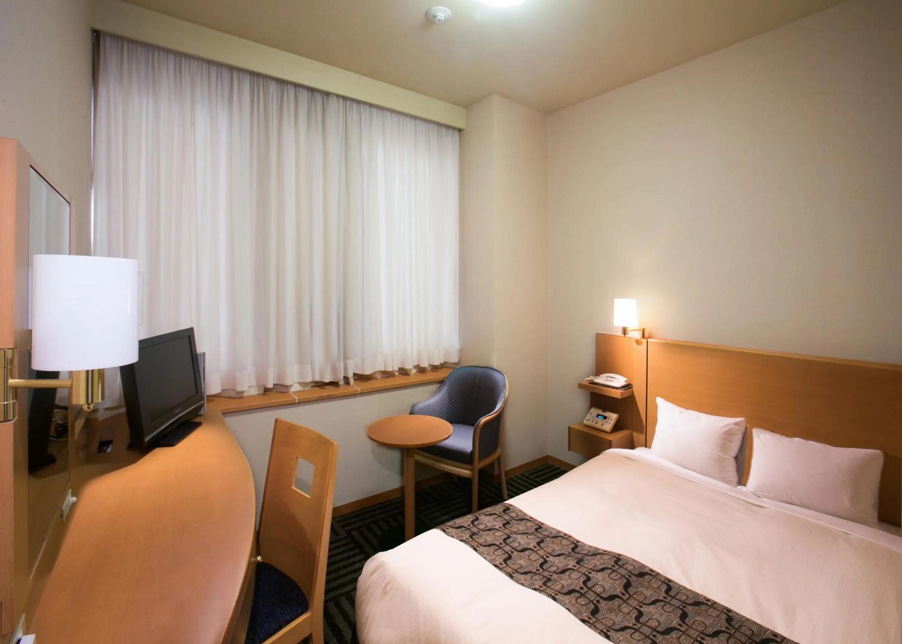 Photo of the whole room, Bed in Yamagata Eki Nishiguchi Washington Hotel