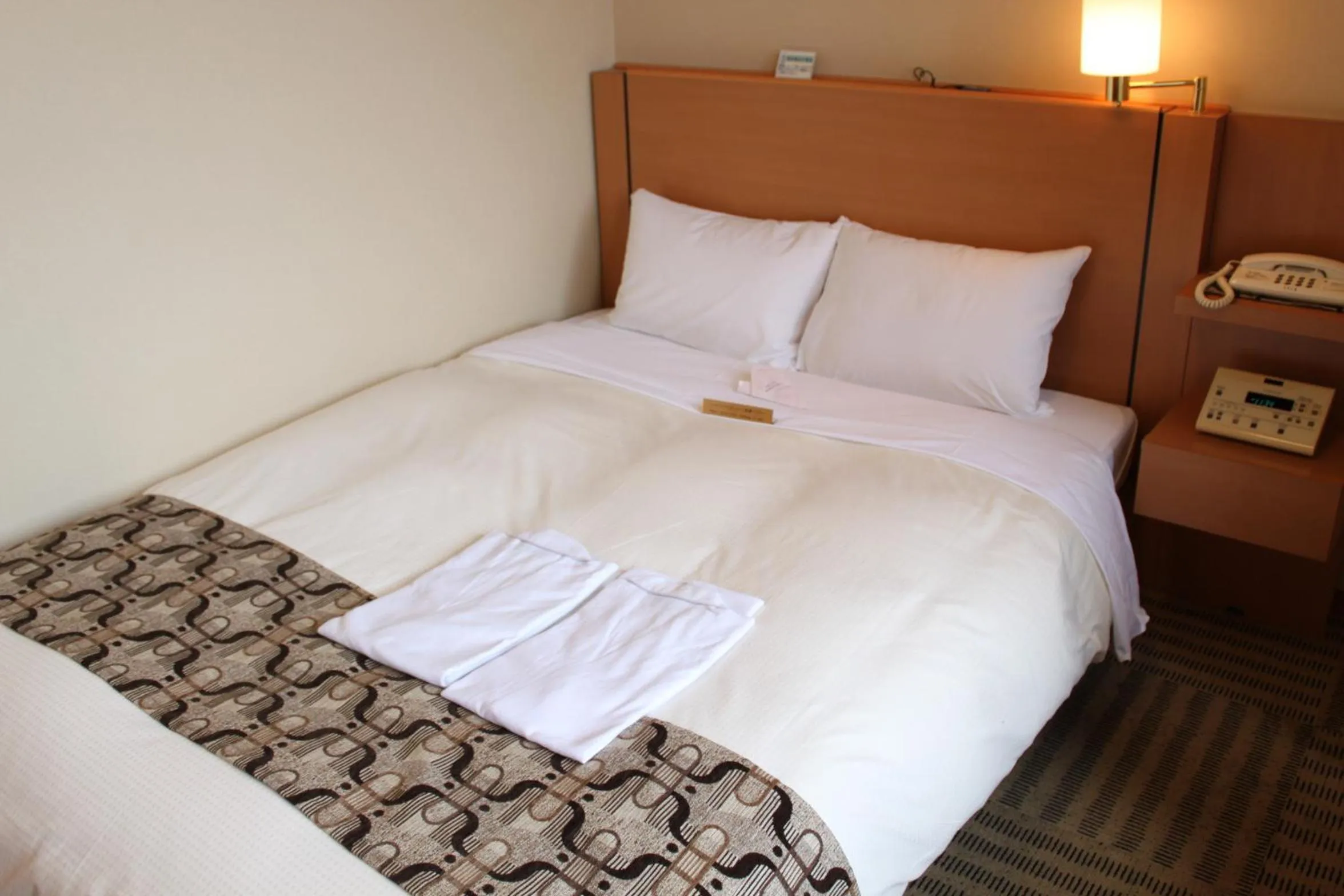 Photo of the whole room, Bed in Yamagata Eki Nishiguchi Washington Hotel