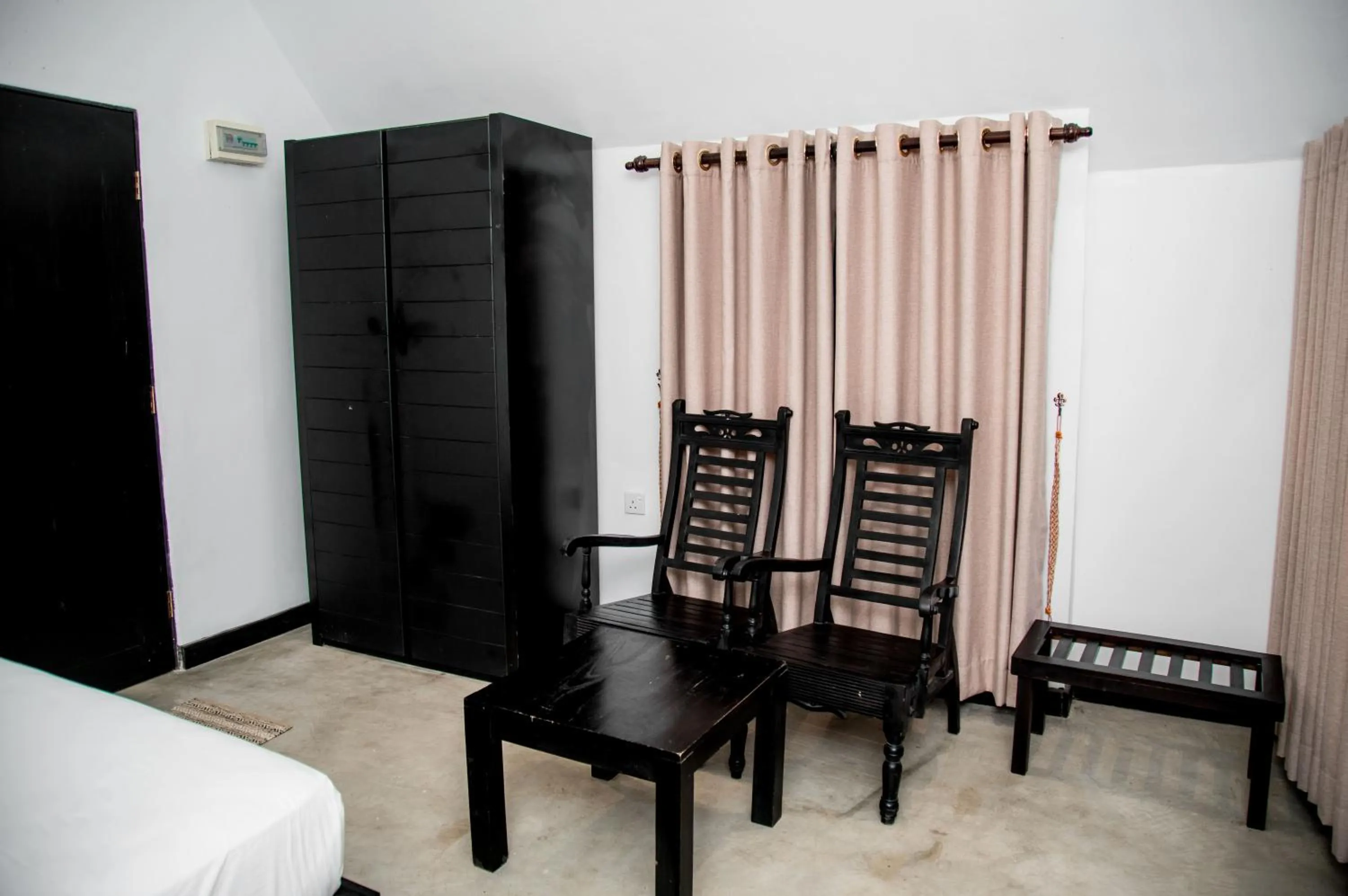 Seating area, Bed in Lavendish Wild Safari