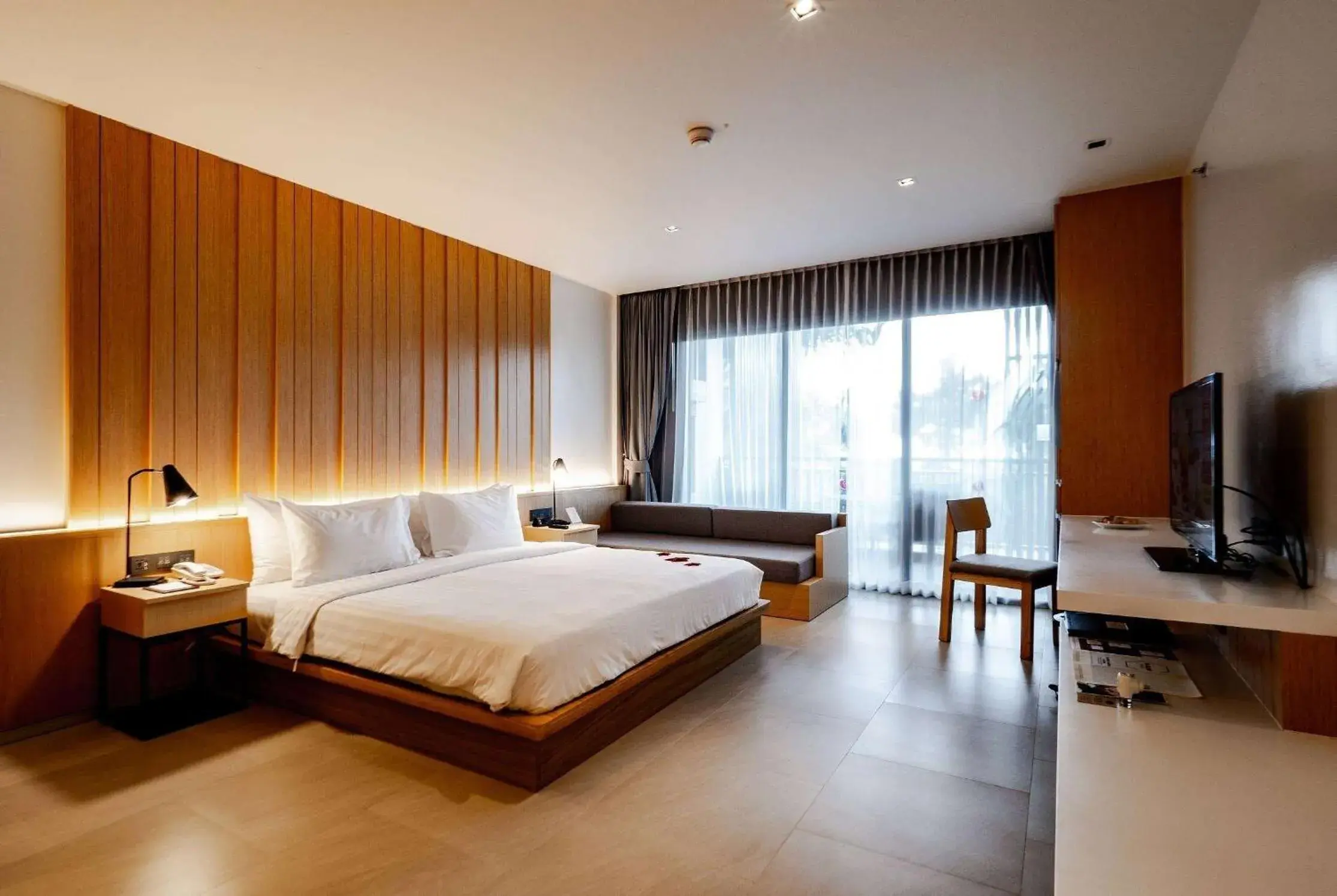 Bed in Ramada Resort by Wyndham Khao Lak Bed in Ramada Resort by Wyndham Khao Lak