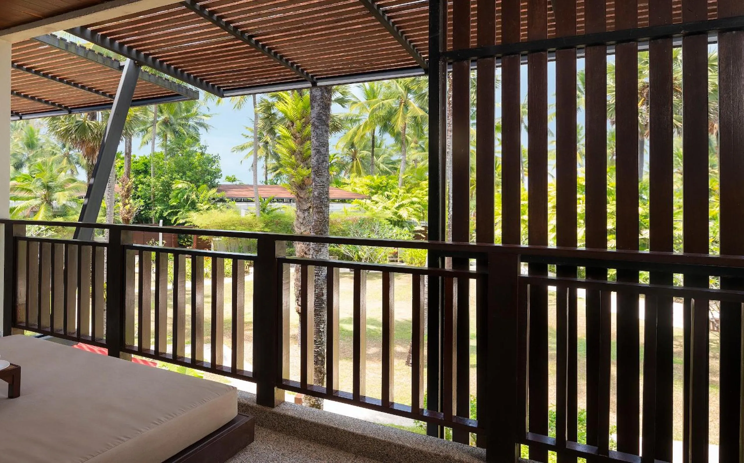 Balcony/Terrace, Bed in Ramada Resort by Wyndham Khao Lak