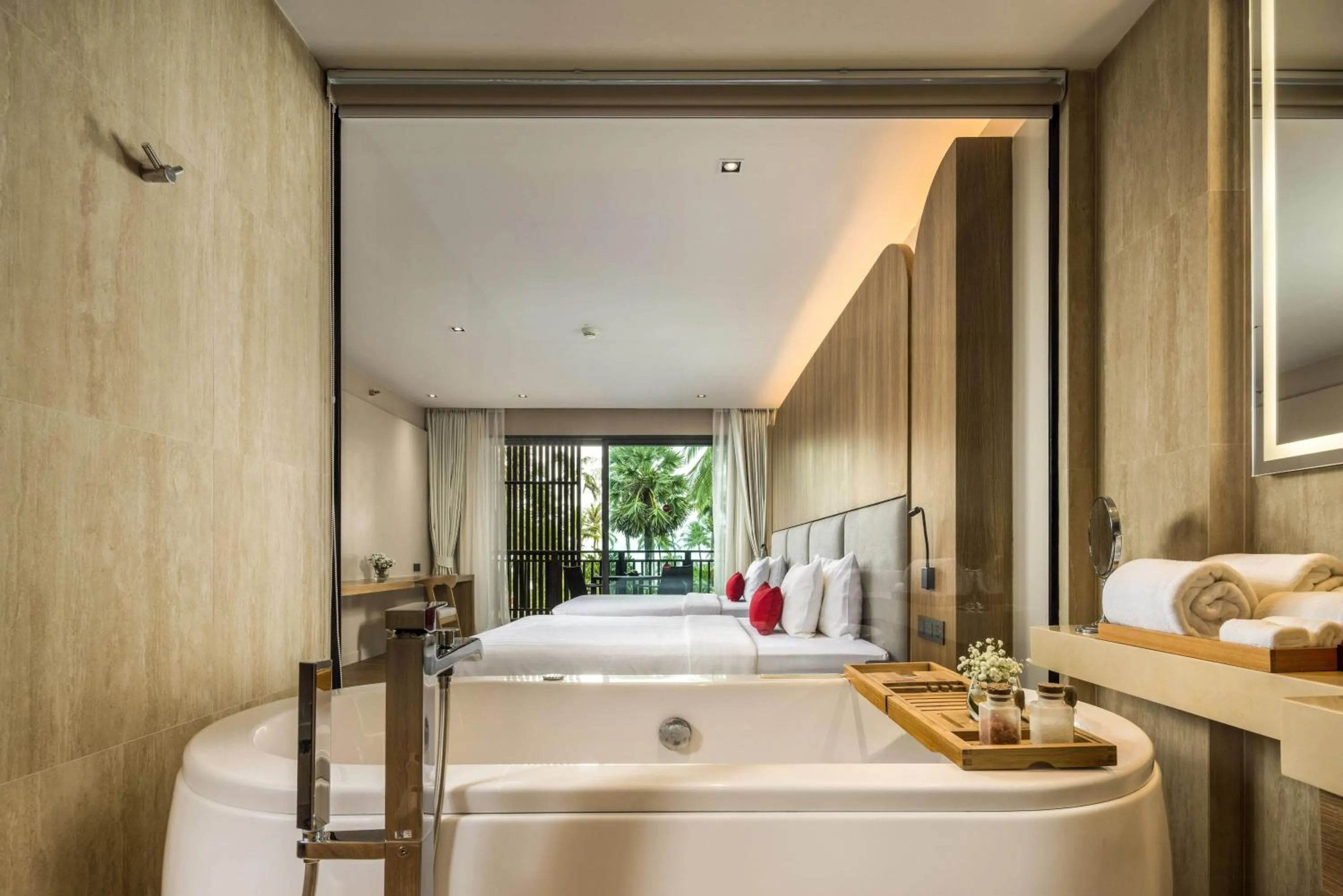 Bathroom, Bed in Ramada Resort by Wyndham Khao Lak