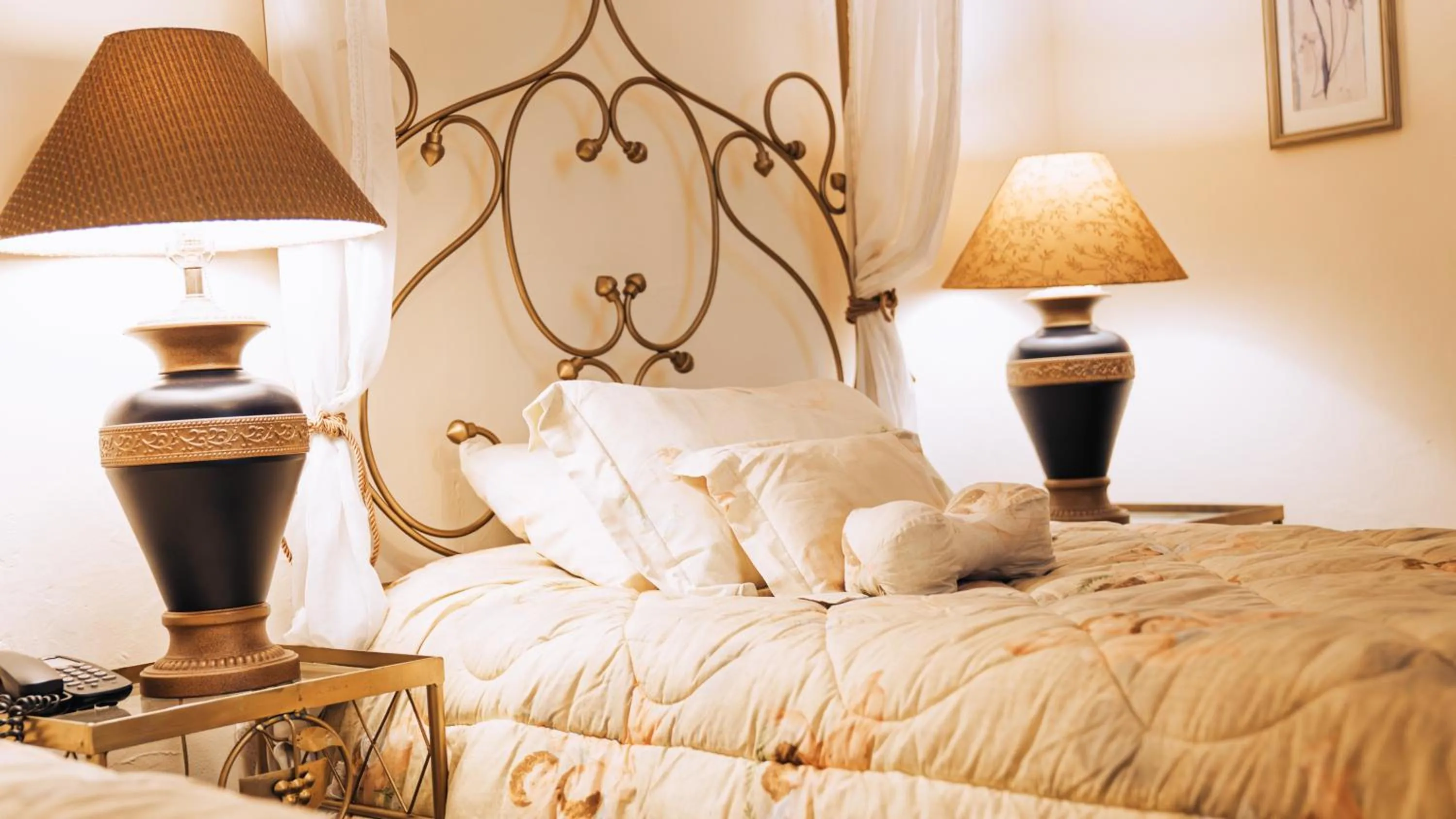 Bed in Boutique Hotel Mansion del Angel