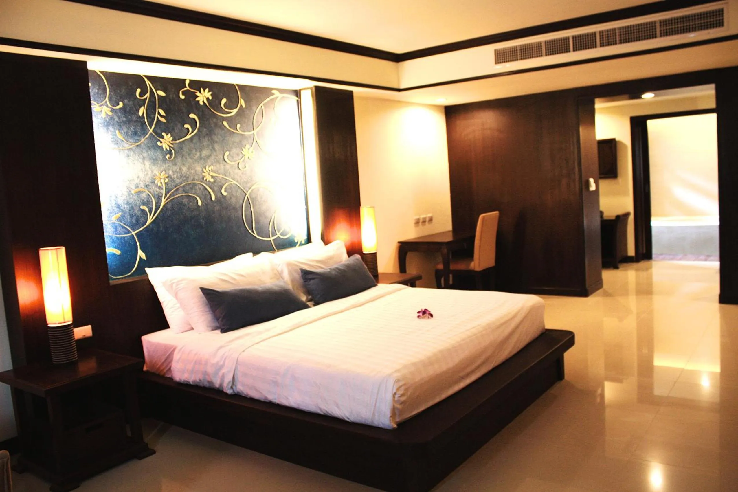 Bed in Khaolak Orchid Beach Resort - SHA Extra Plus