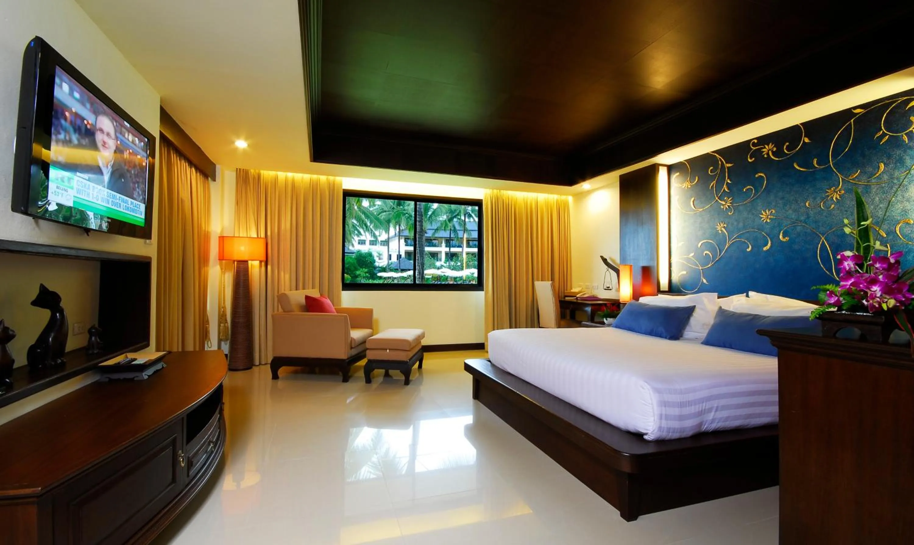 Bed in Khaolak Orchid Beach Resort - SHA Extra Plus
