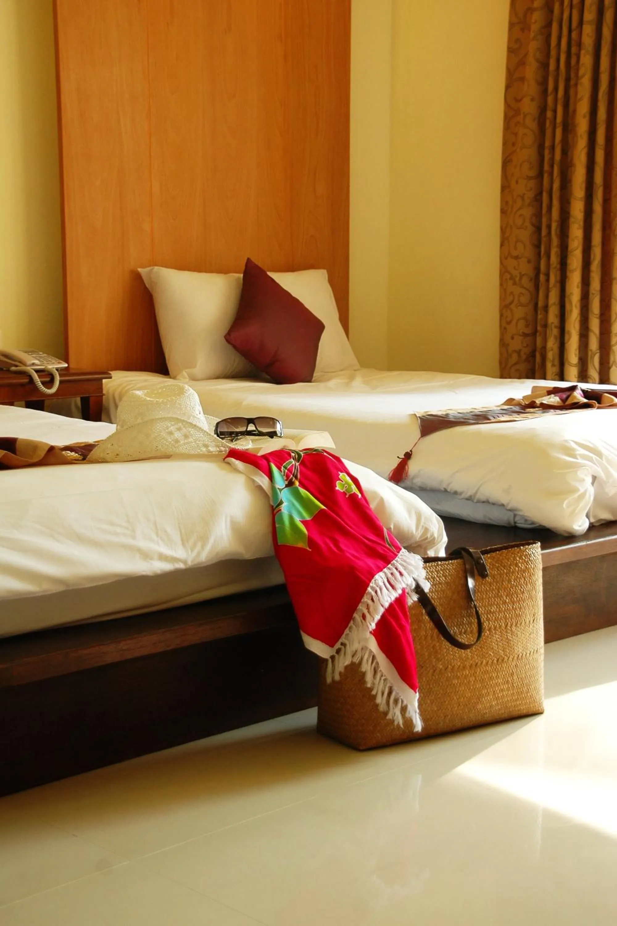 Bed in Khaolak Orchid Beach Resort - SHA Extra Plus
