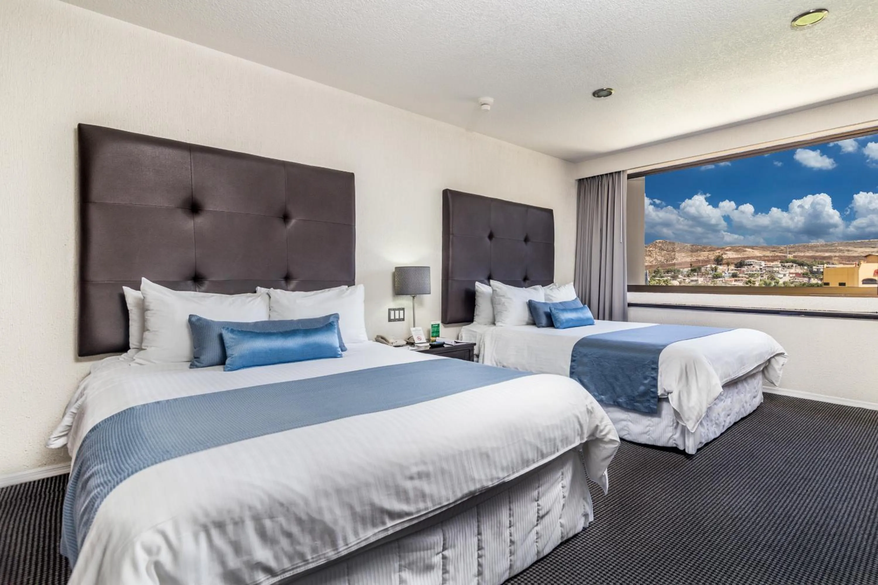 Bed in Pueblo Amigo Hotel Plaza y Casino