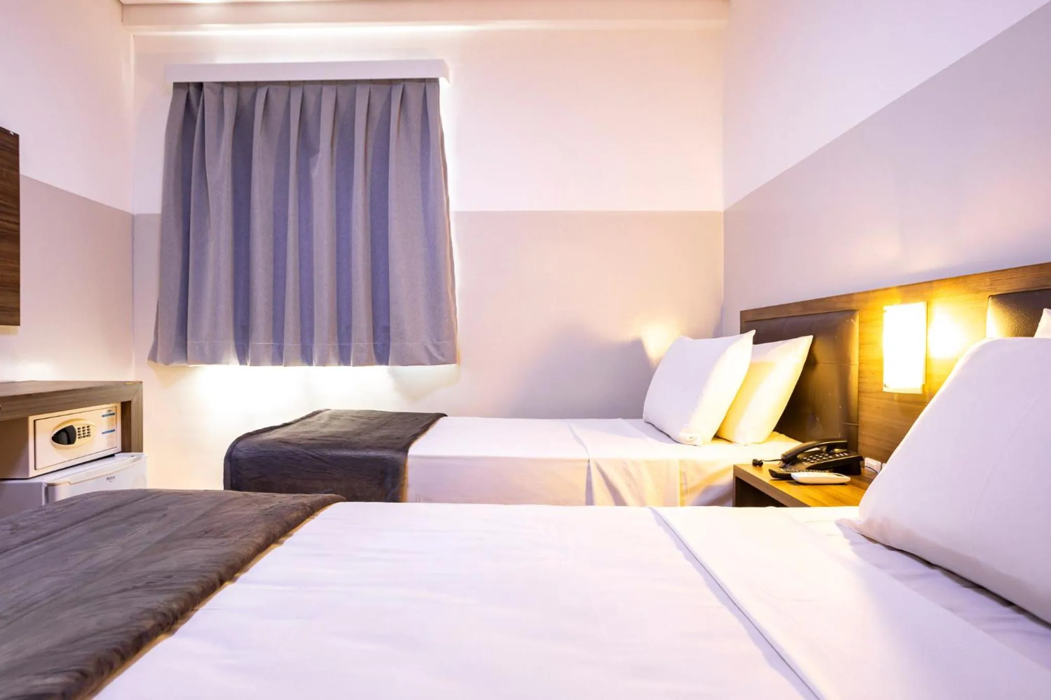 Bed in Travel Inn Express Hotels Brás