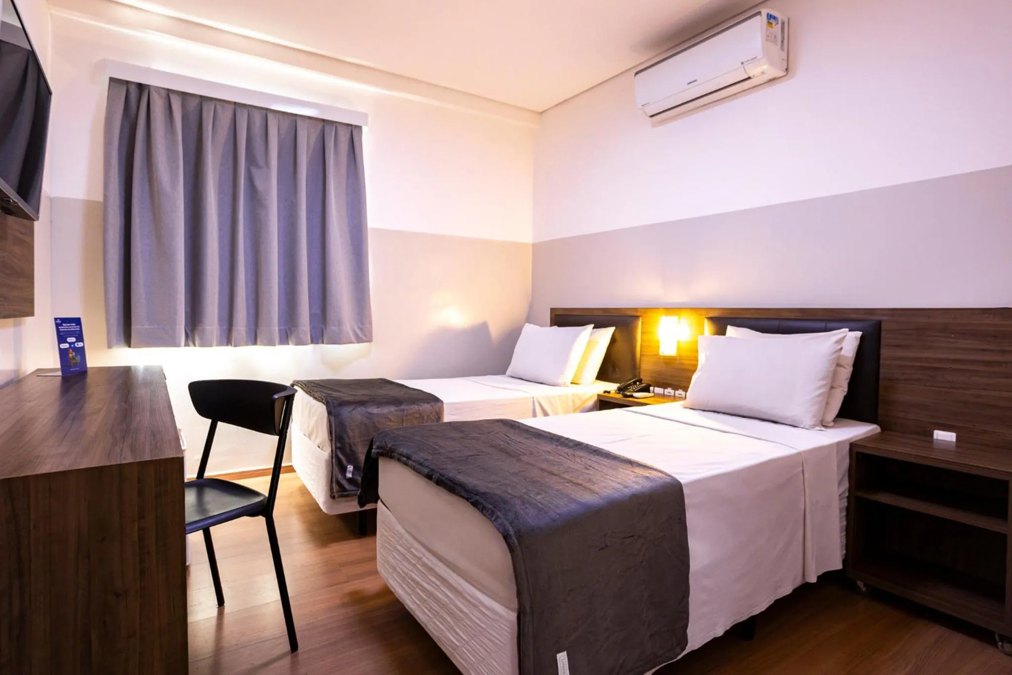 Bed in Travel Inn Express Hotels Brás