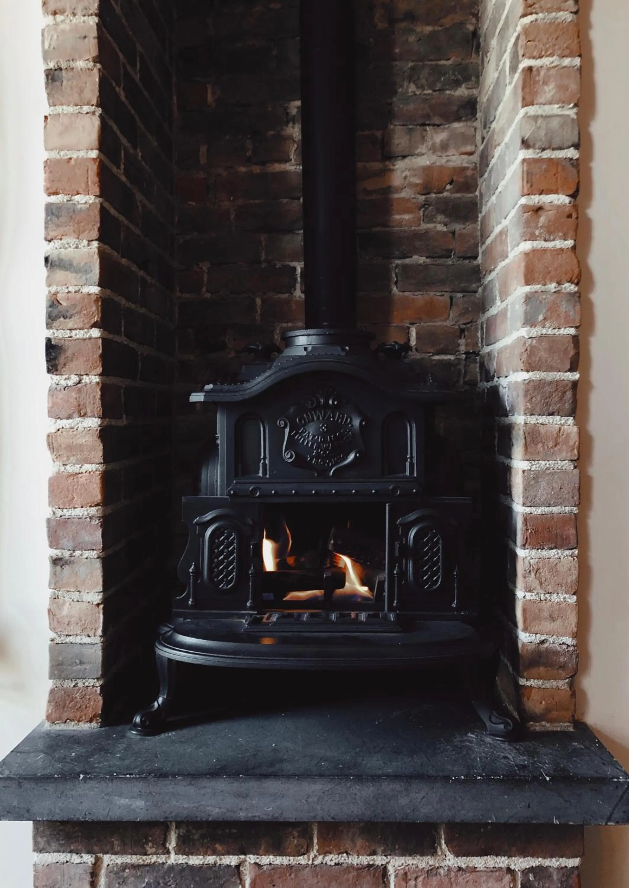 fireplace in Wm. Farmer and Sons