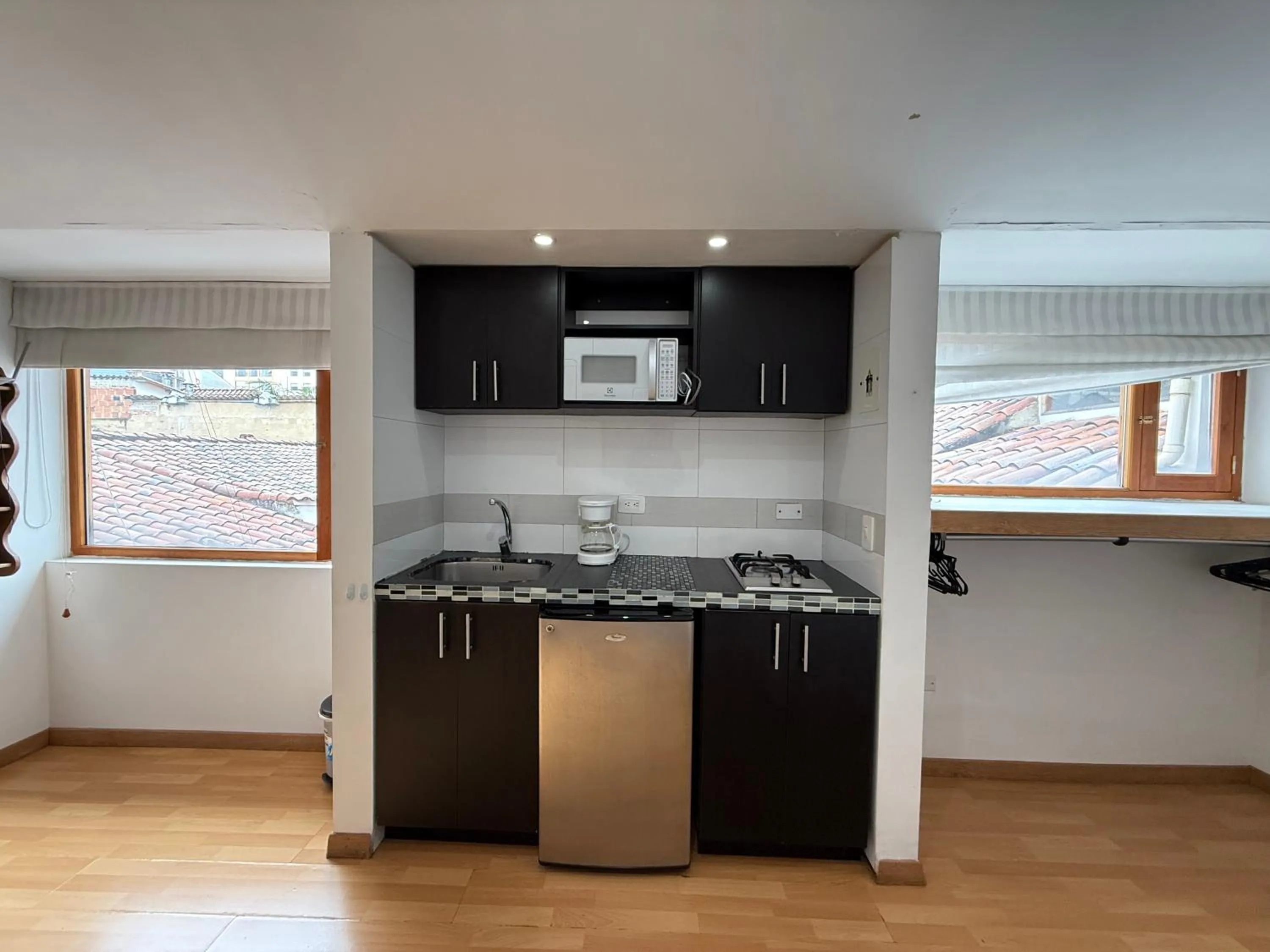 kitchen in Apartaestudios La Candelaria