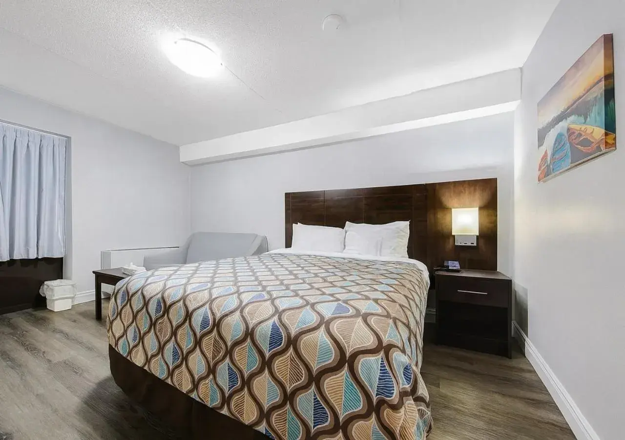 Bed in Deluxe Inn Bed in Deluxe Inn