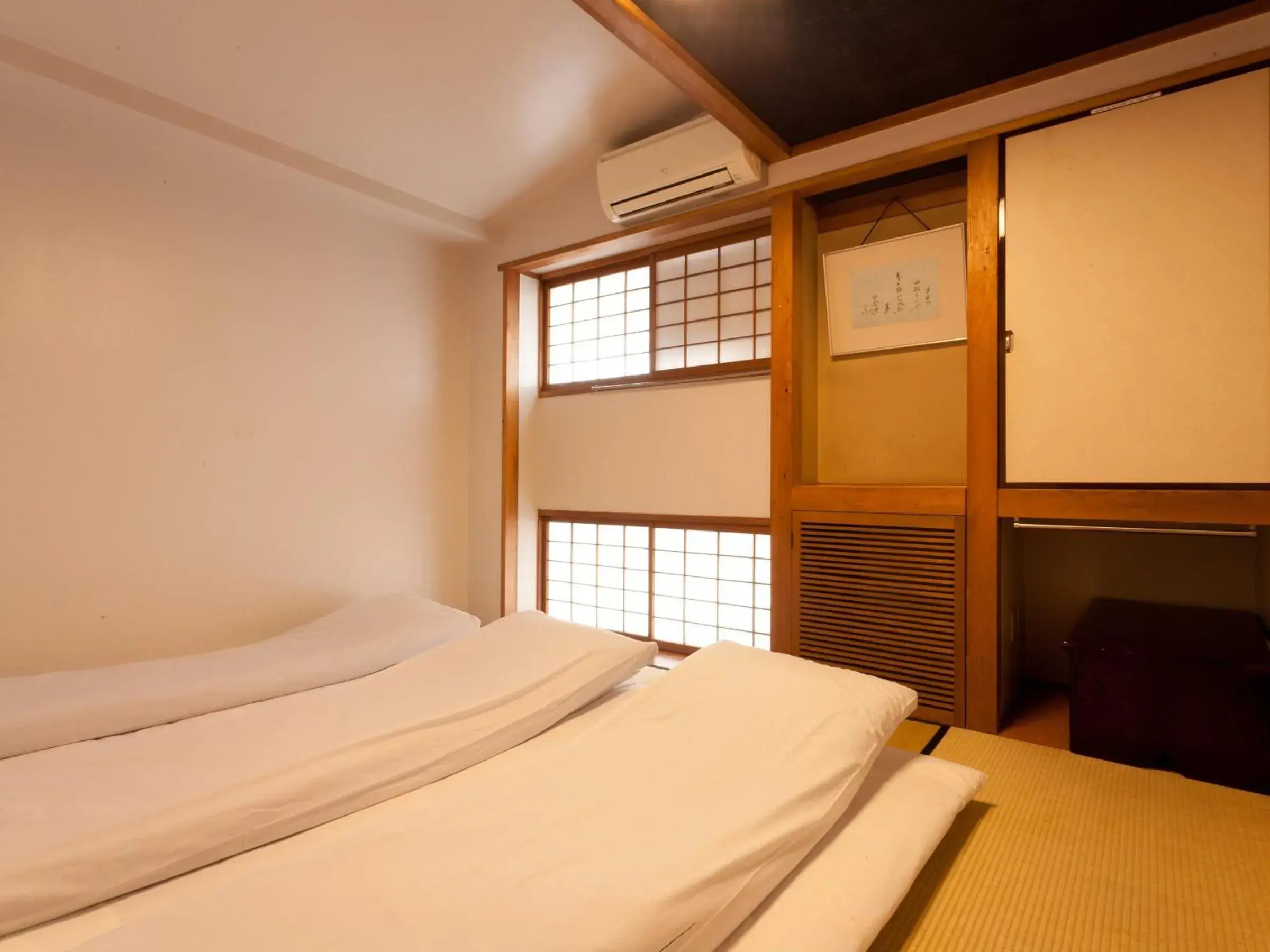 Bed in Kimi Ryokan Bed in Kimi Ryokan