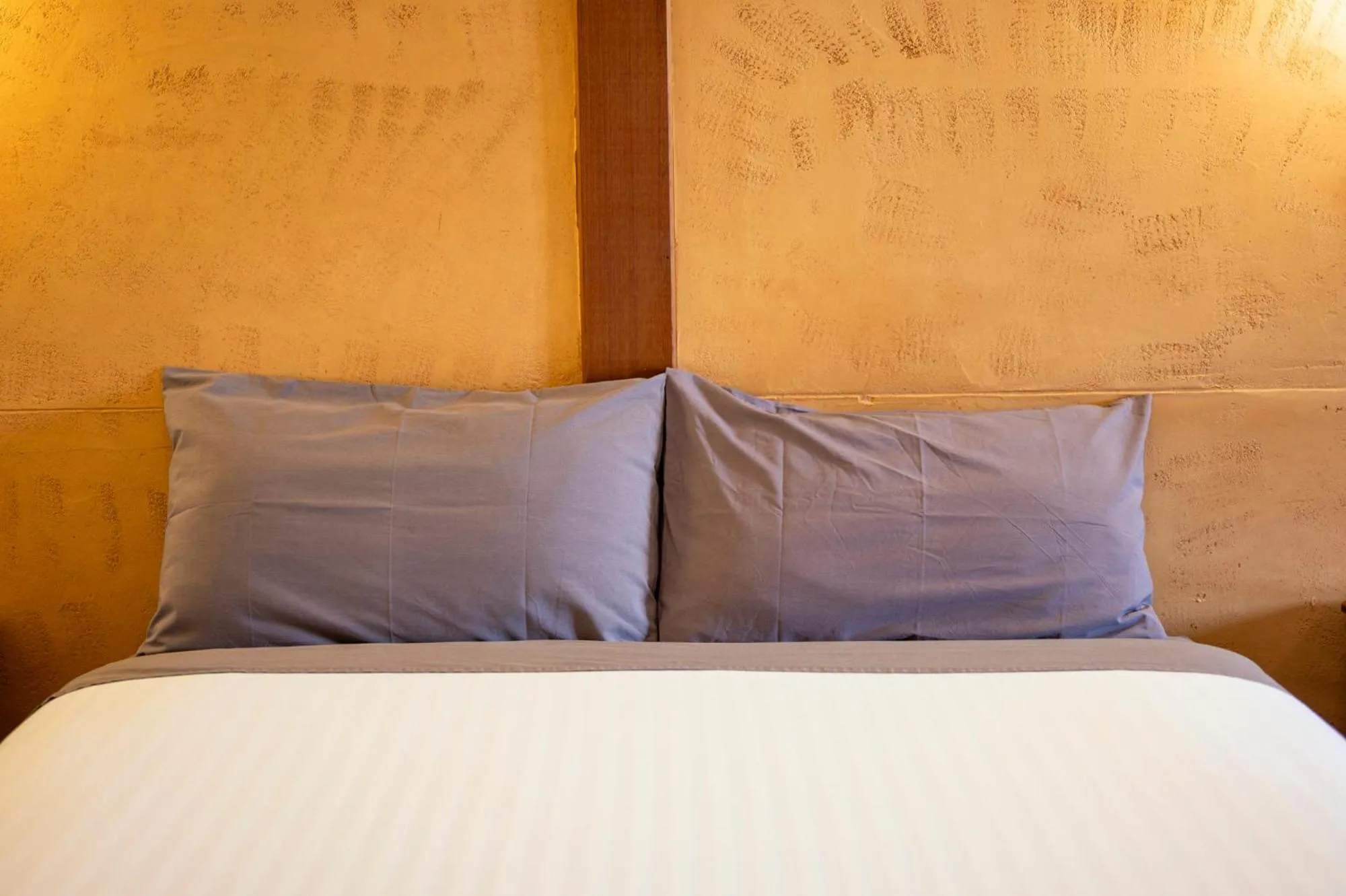 Bedroom, Bed in Mud Hut Motel