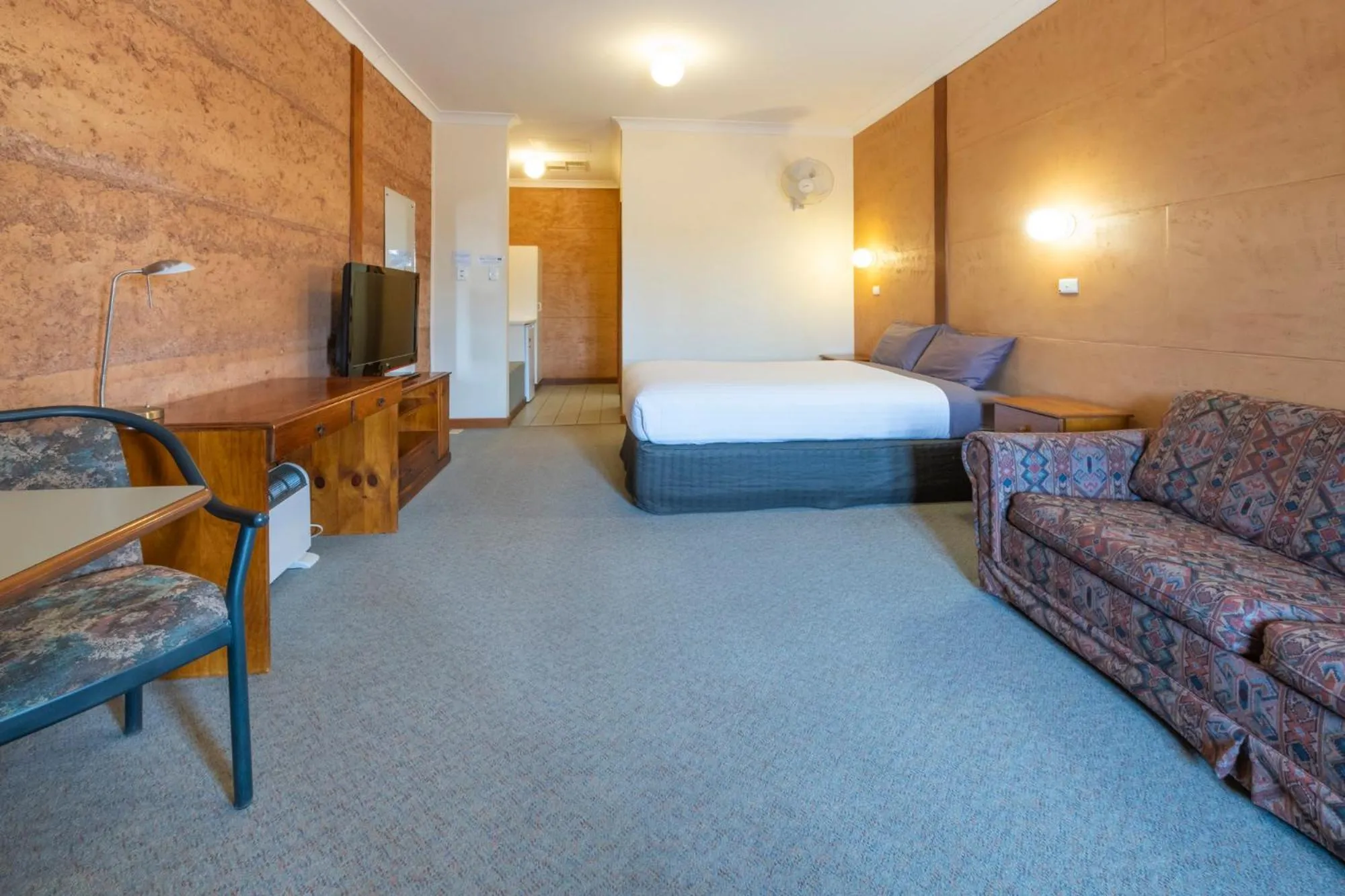 Photo of the whole room, Bed in Mud Hut Motel