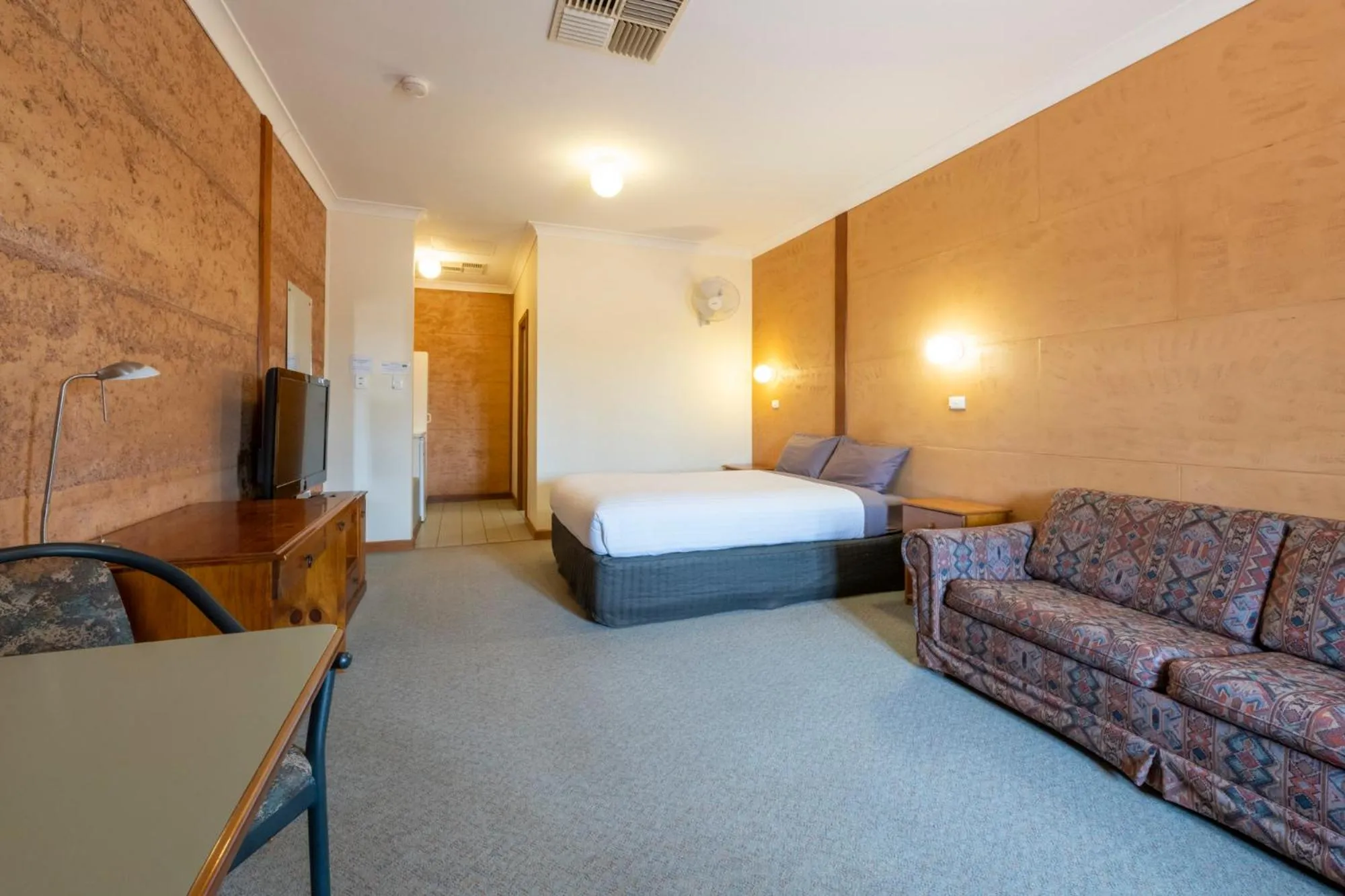 Photo of the whole room, Bed in Mud Hut Motel