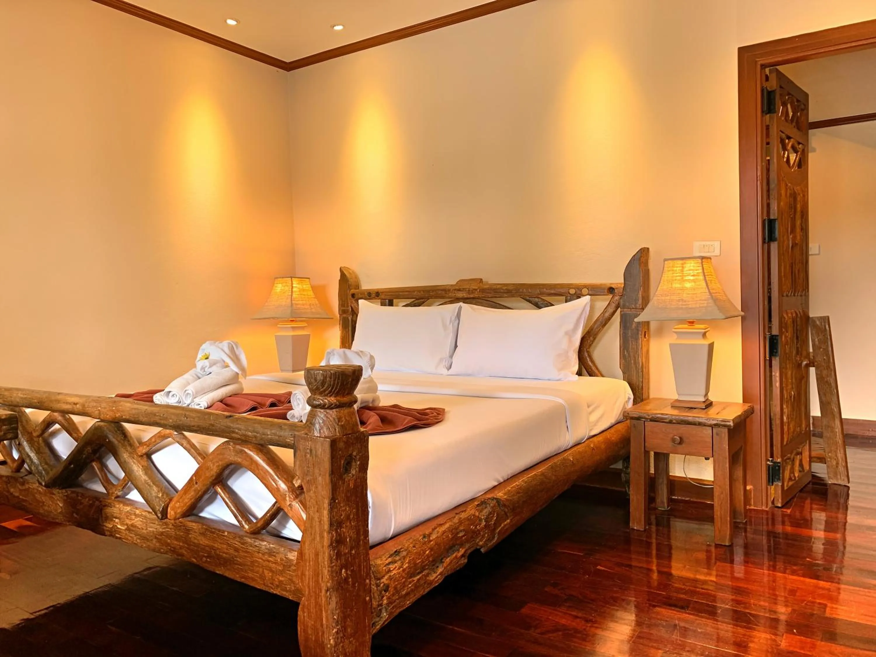 Bed in Baan Hin Sai Resort & Spa