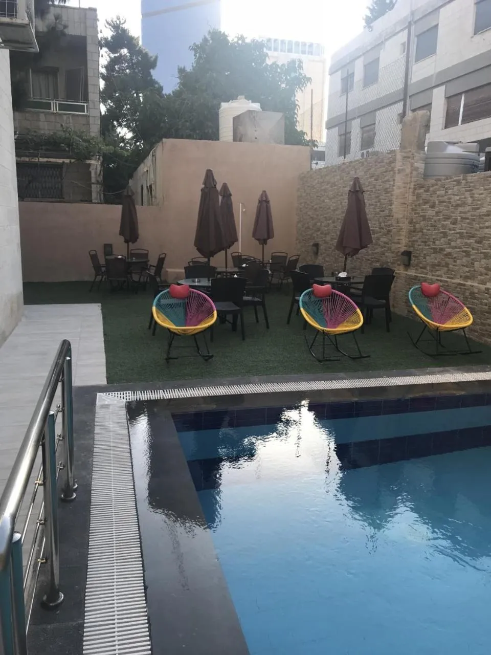 Swimming pool in Almond Hotel Apartments