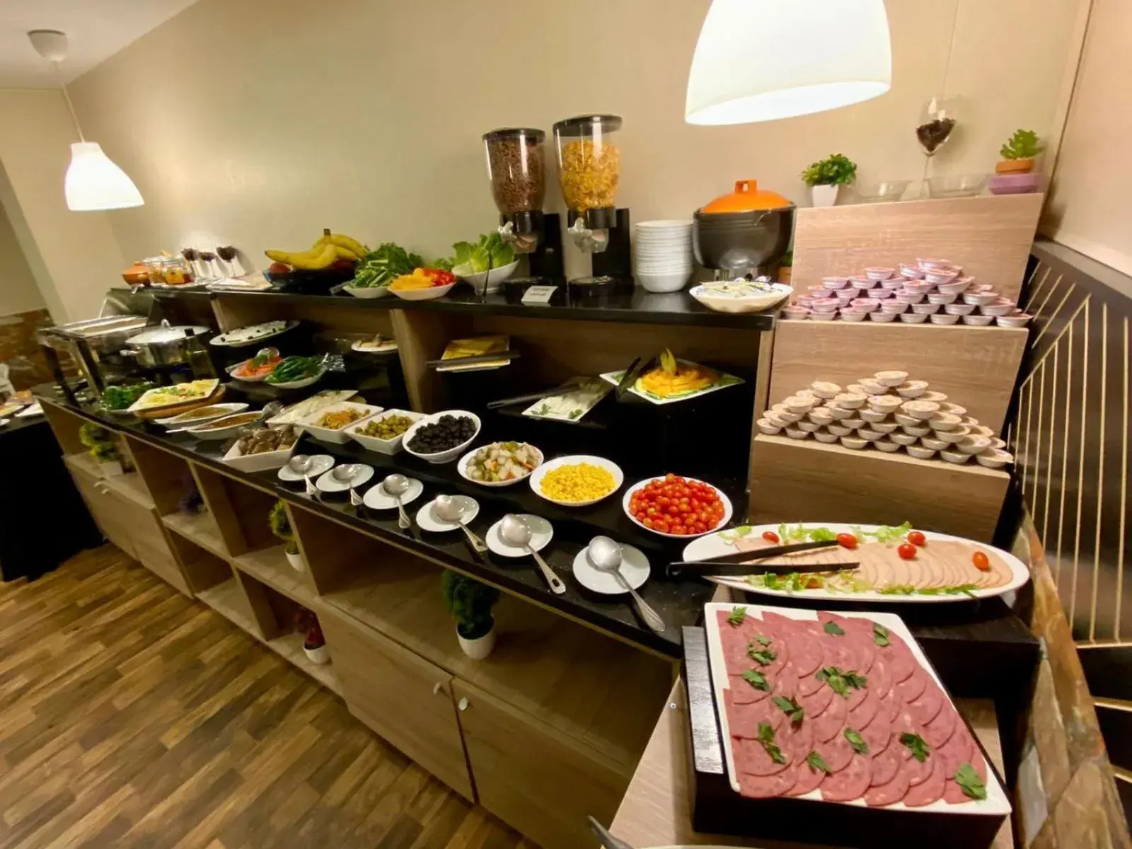 Buffet breakfast in Almond Hotel Apartments