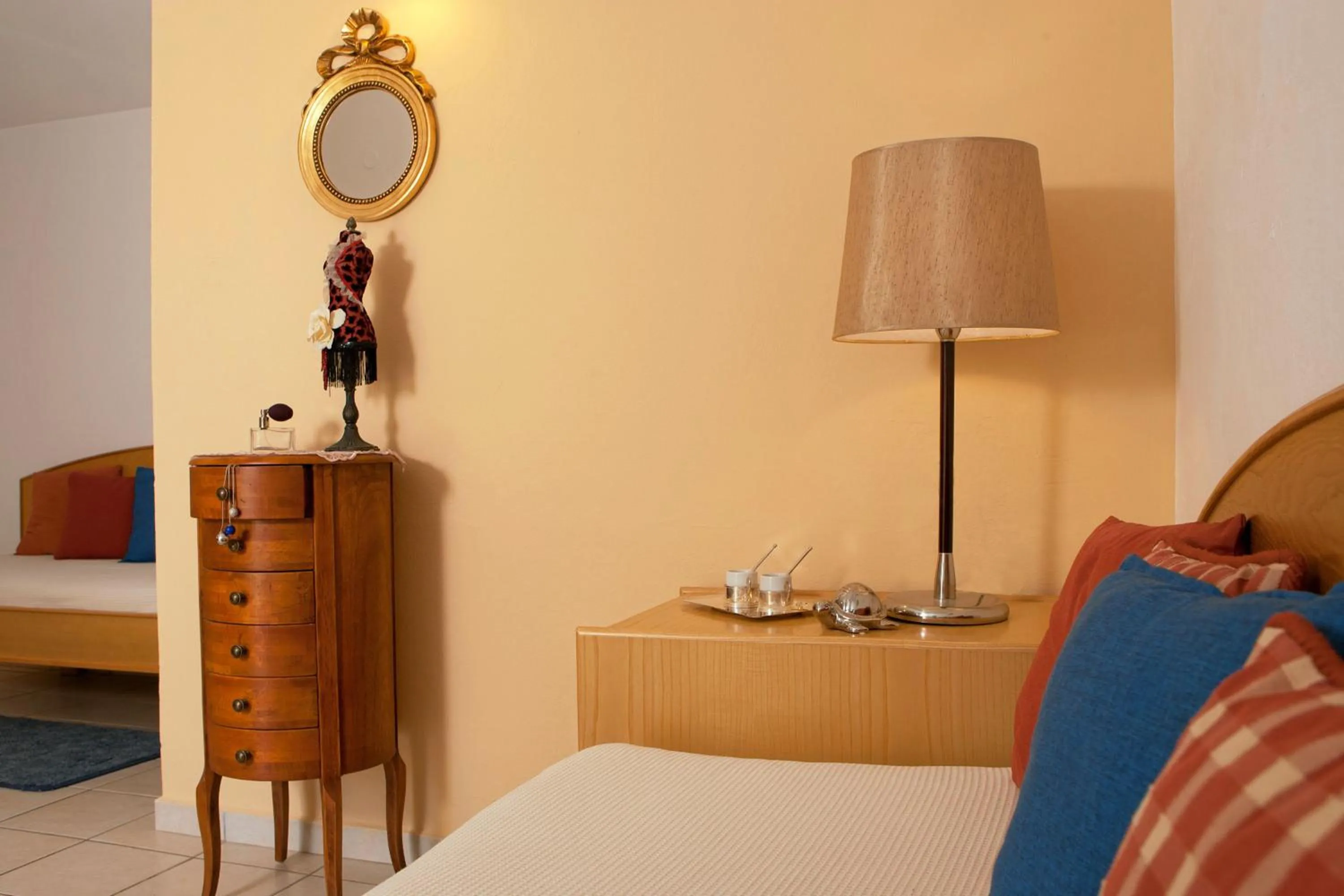 Living room, Bed in Villa Mare Monte ApartHotel