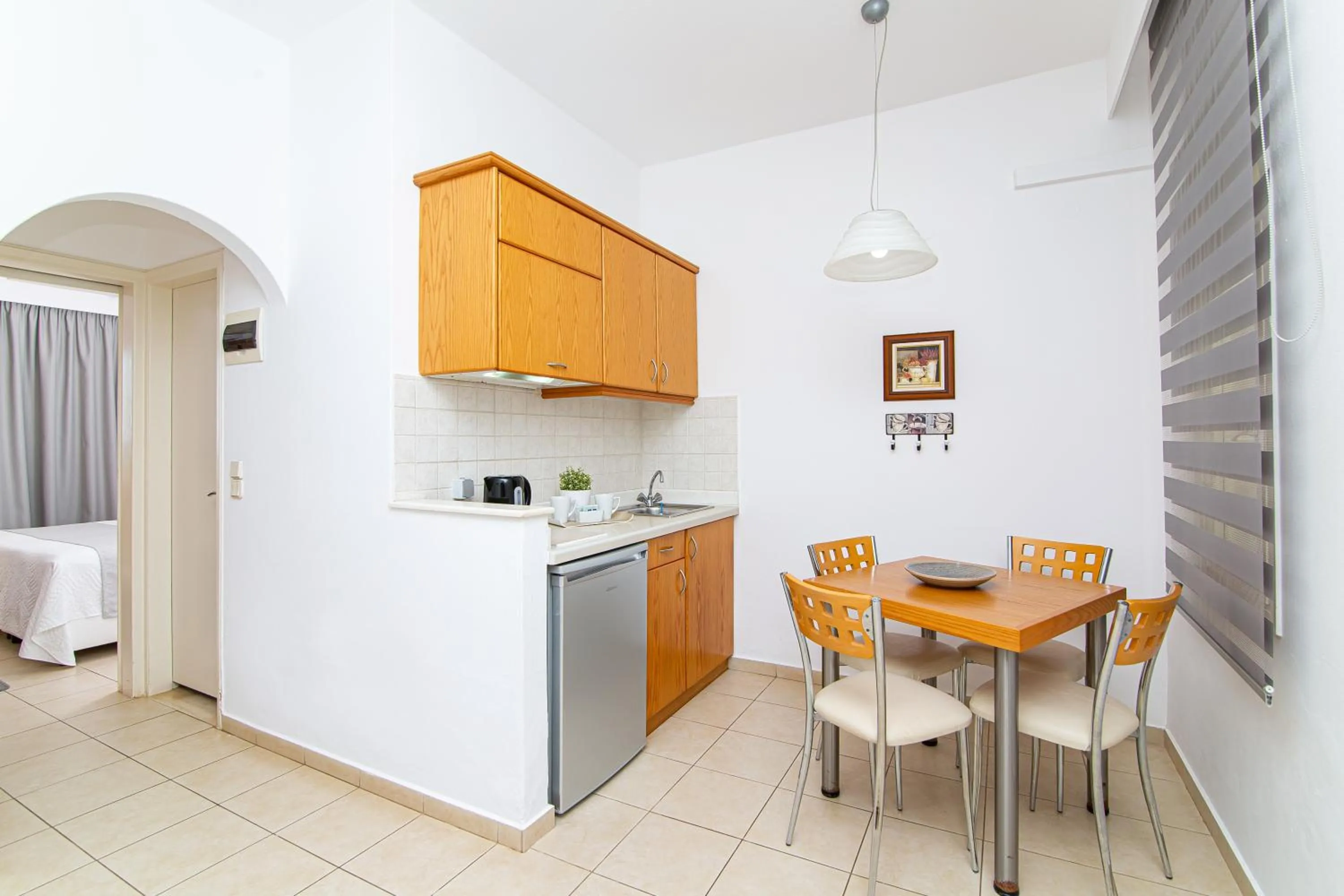 Kitchen or kitchenette in Villa Mare Monte ApartHotel