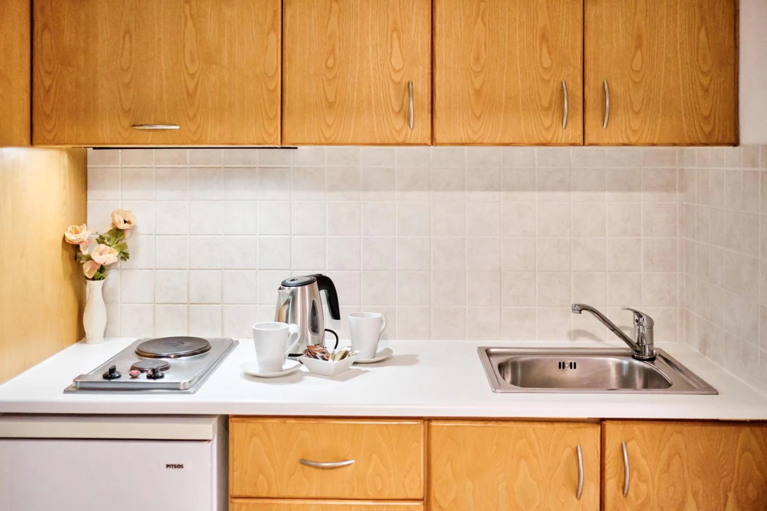 Kitchen or kitchenette in Villa Mare Monte ApartHotel