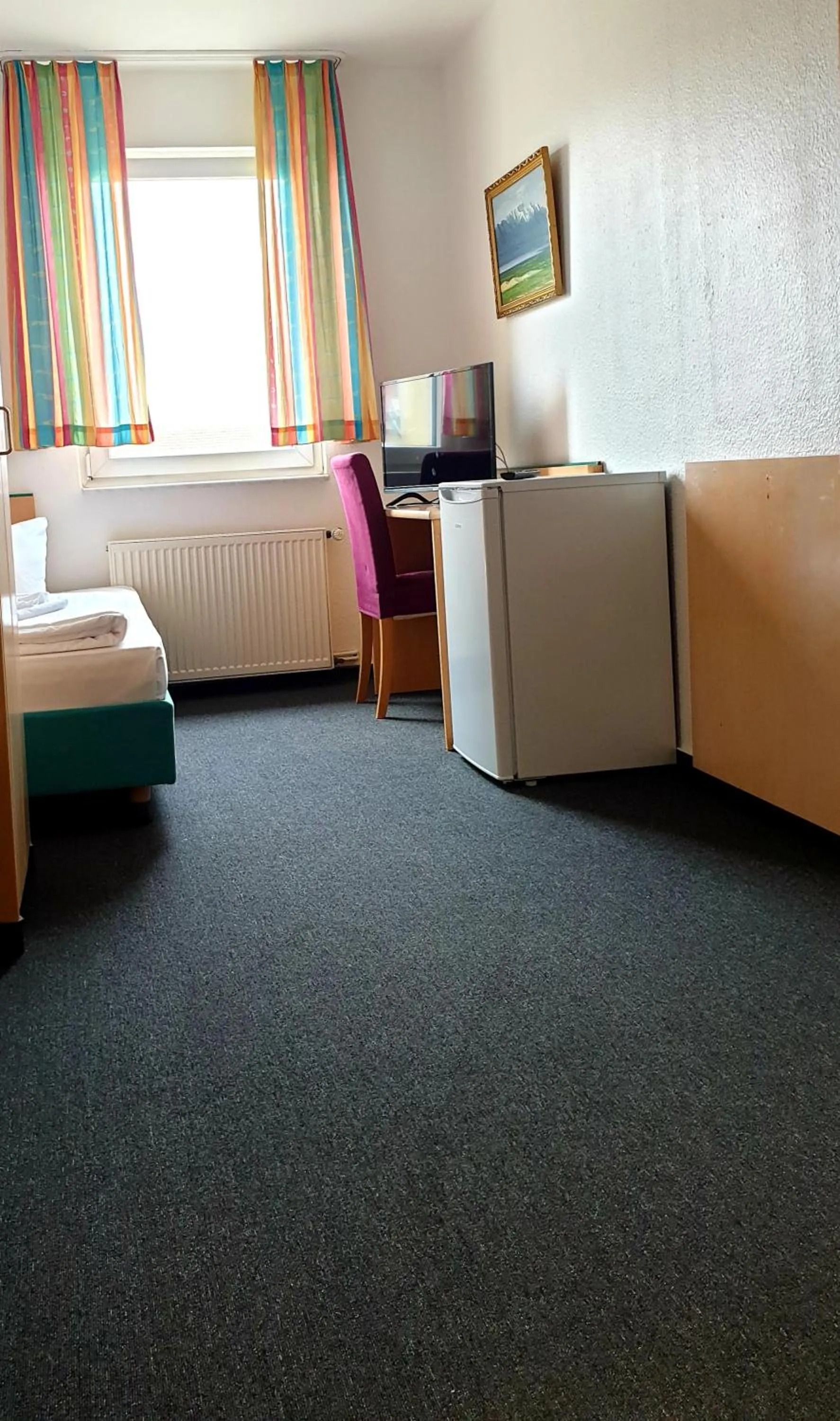 Seating area, Bed in Hotel-Pension ODIN