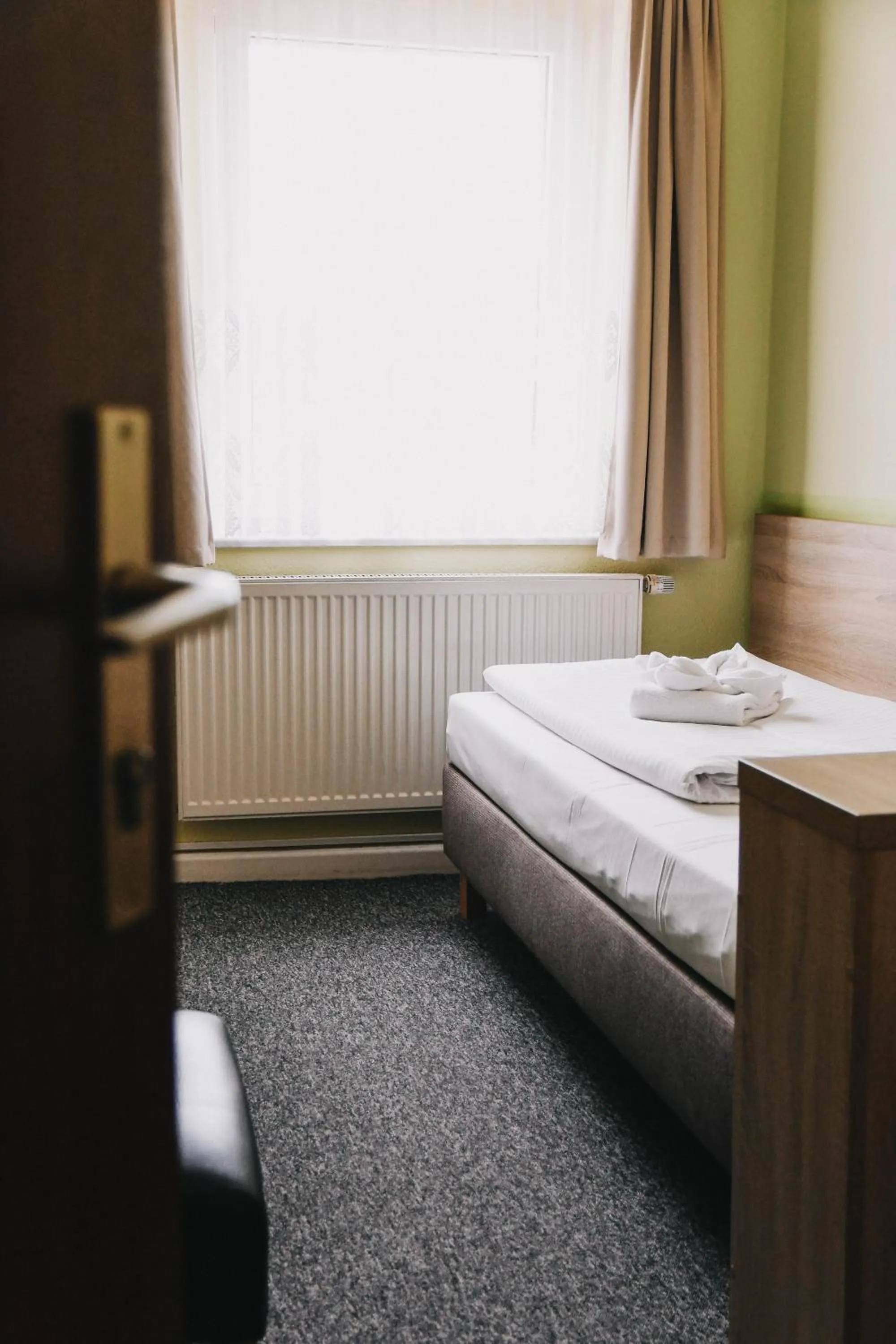 Bed in Hotel-Pension ODIN